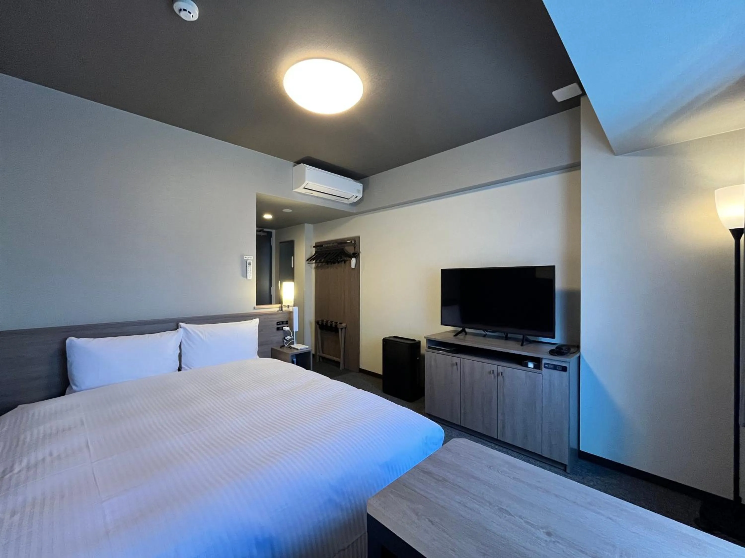 Photo of the whole room, Bed in Hotel Route Inn Grand Fukushima Ekimae Higashiguchi