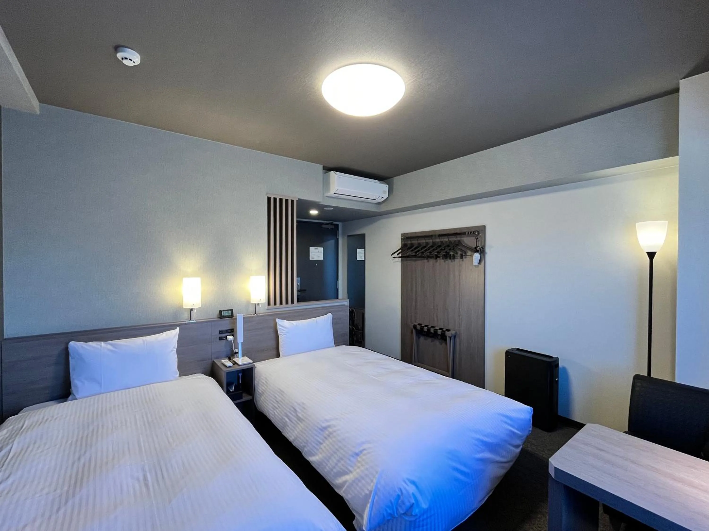 Photo of the whole room, Bed in Hotel Route Inn Grand Fukushima Ekimae Higashiguchi