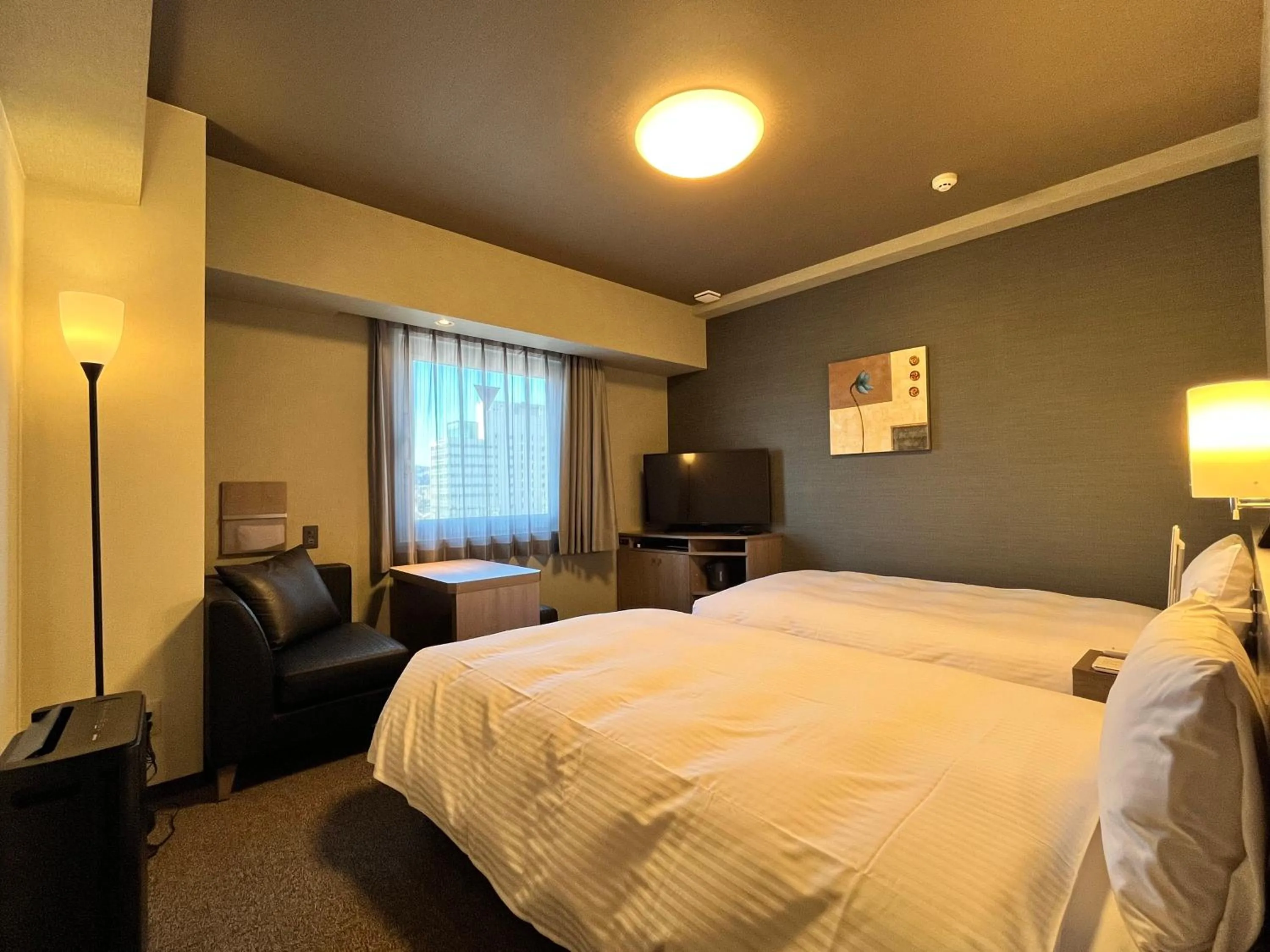 Photo of the whole room, Bed in Hotel Route Inn Grand Fukushima Ekimae Higashiguchi