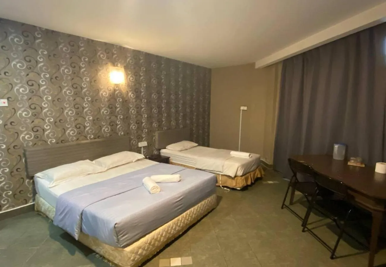 Bed in Hotel Harbour Inn