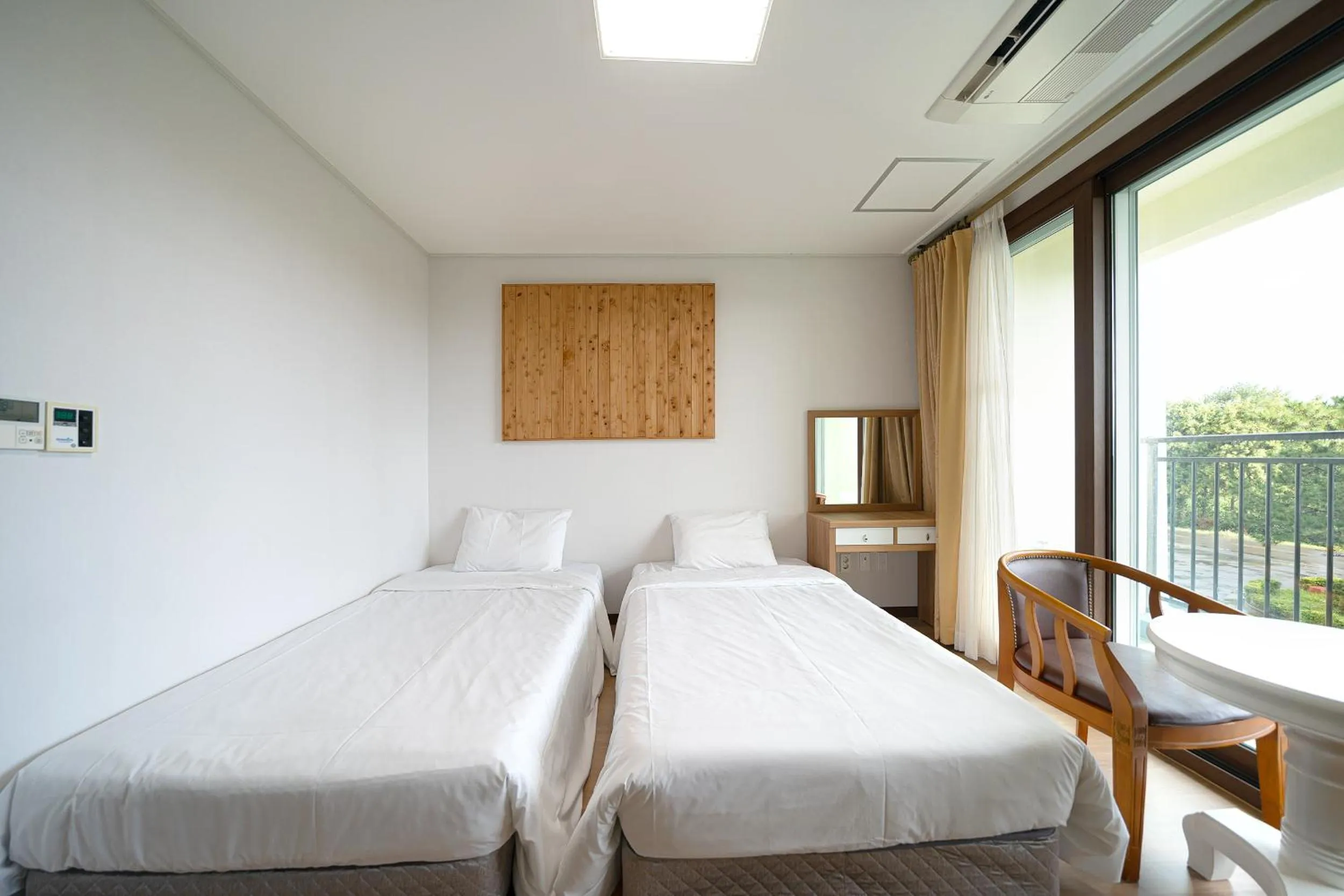 Photo of the whole room, Bed in FromH T Resort Jeju Seongsan