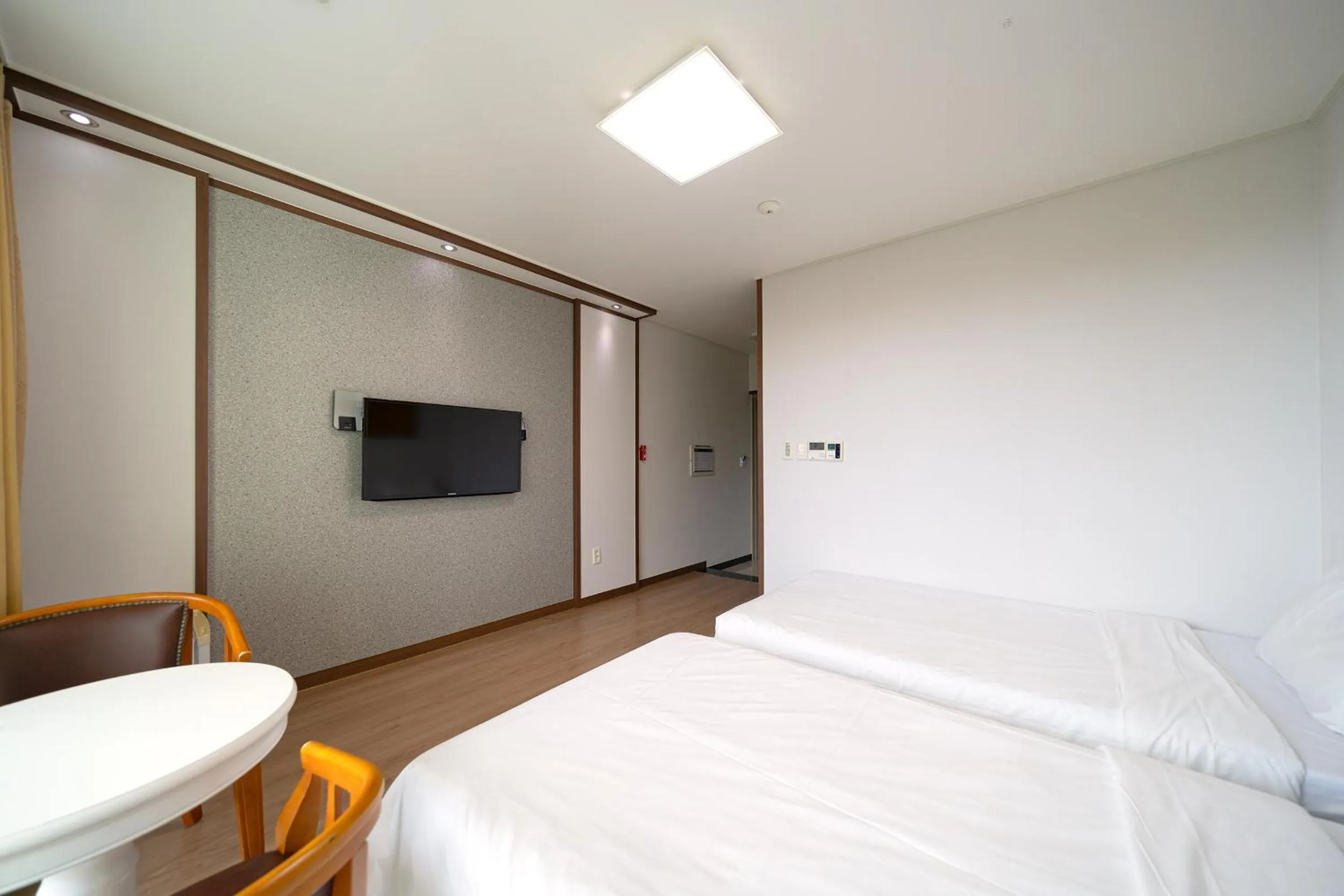 Photo of the whole room, Bed in FromH T Resort Jeju Seongsan