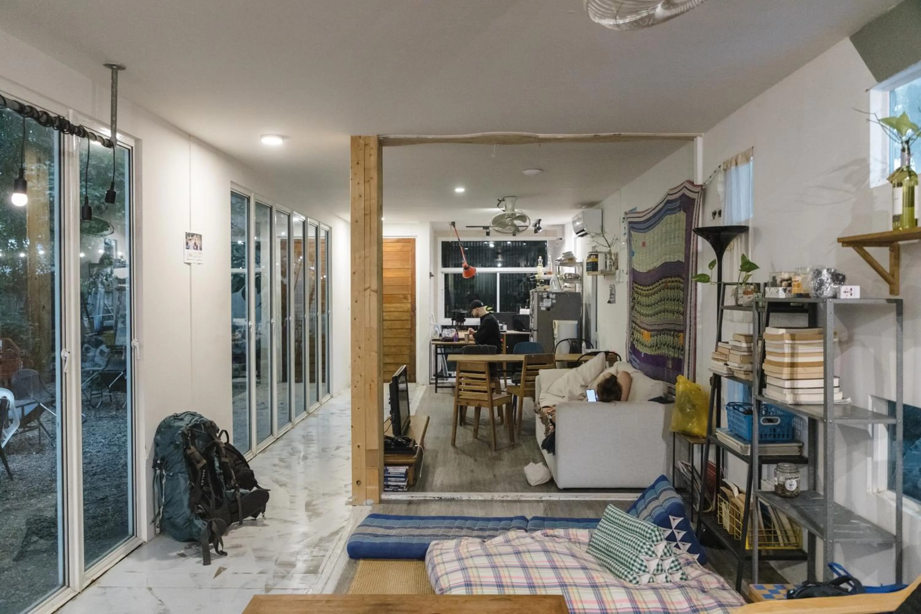 Living room in The Yard Bangkok Hostel