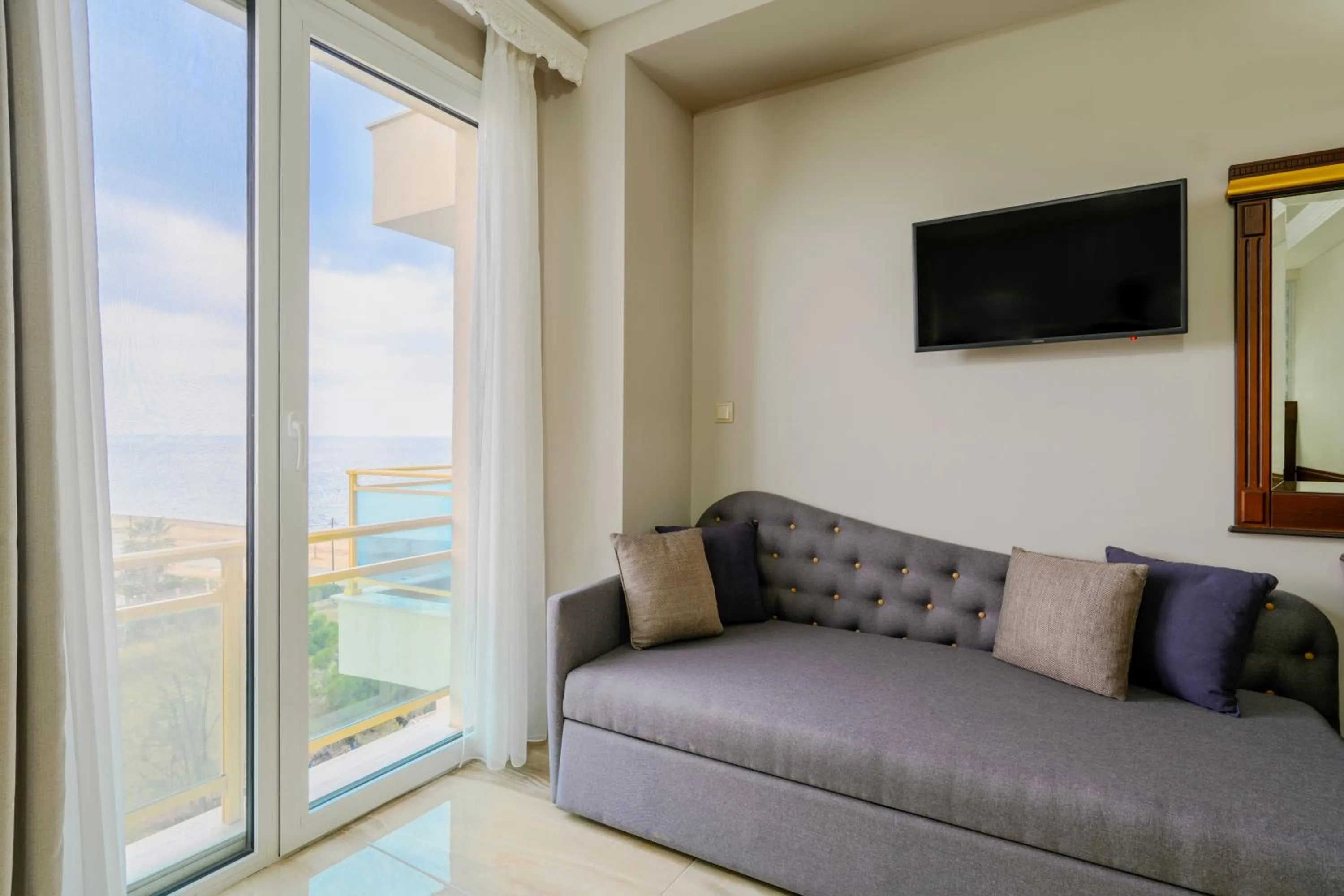 Living room in EONA BEACH RESORT by Greek Pride