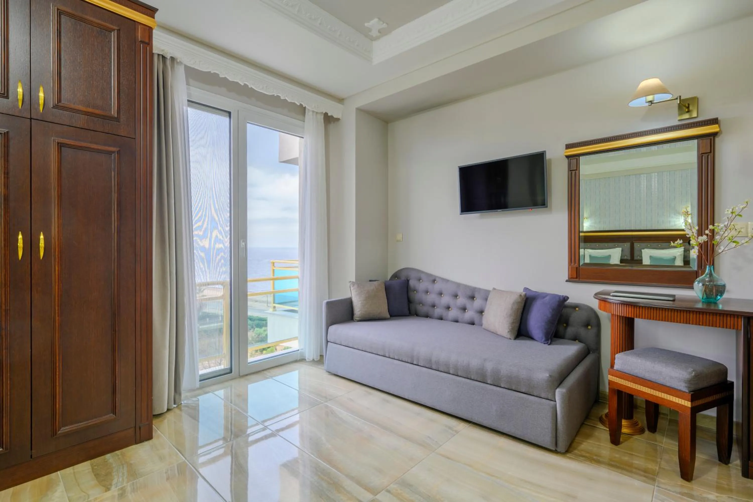 Living room in EONA BEACH RESORT by Greek Pride