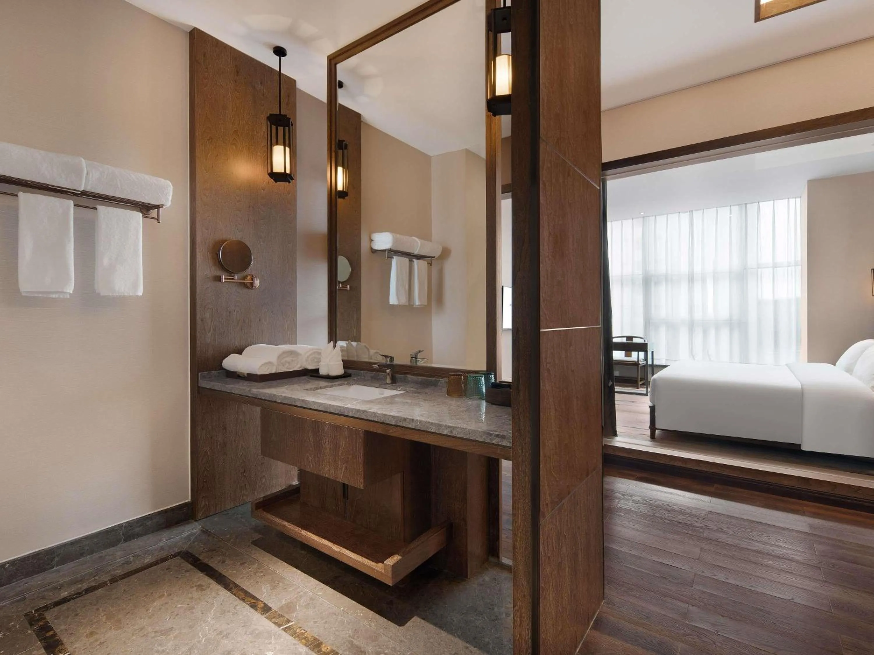 Photo of the whole room, Bed in Grand Mercure Kunming South