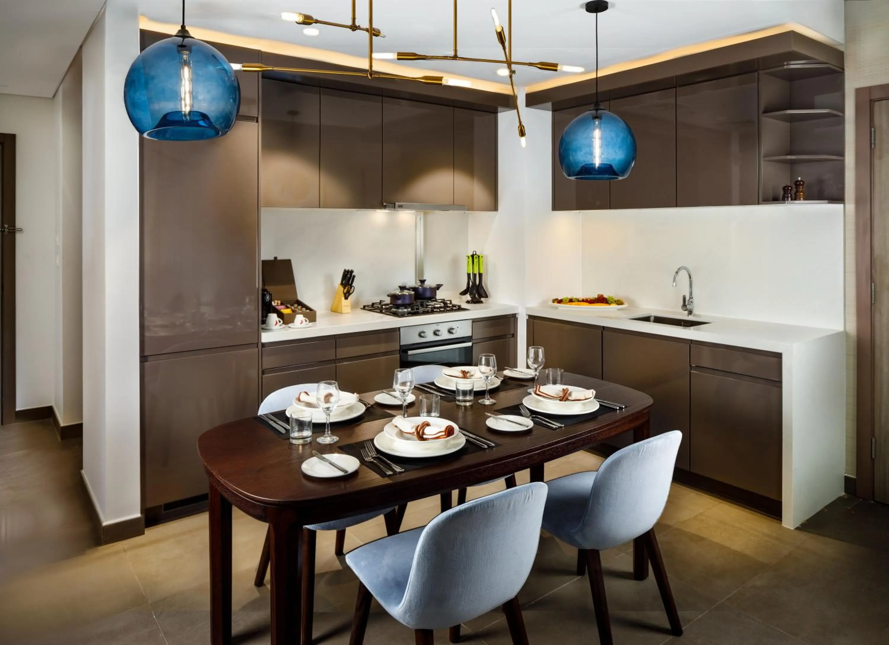 Kitchen or kitchenette in Millennium Residences Saadiyat Island