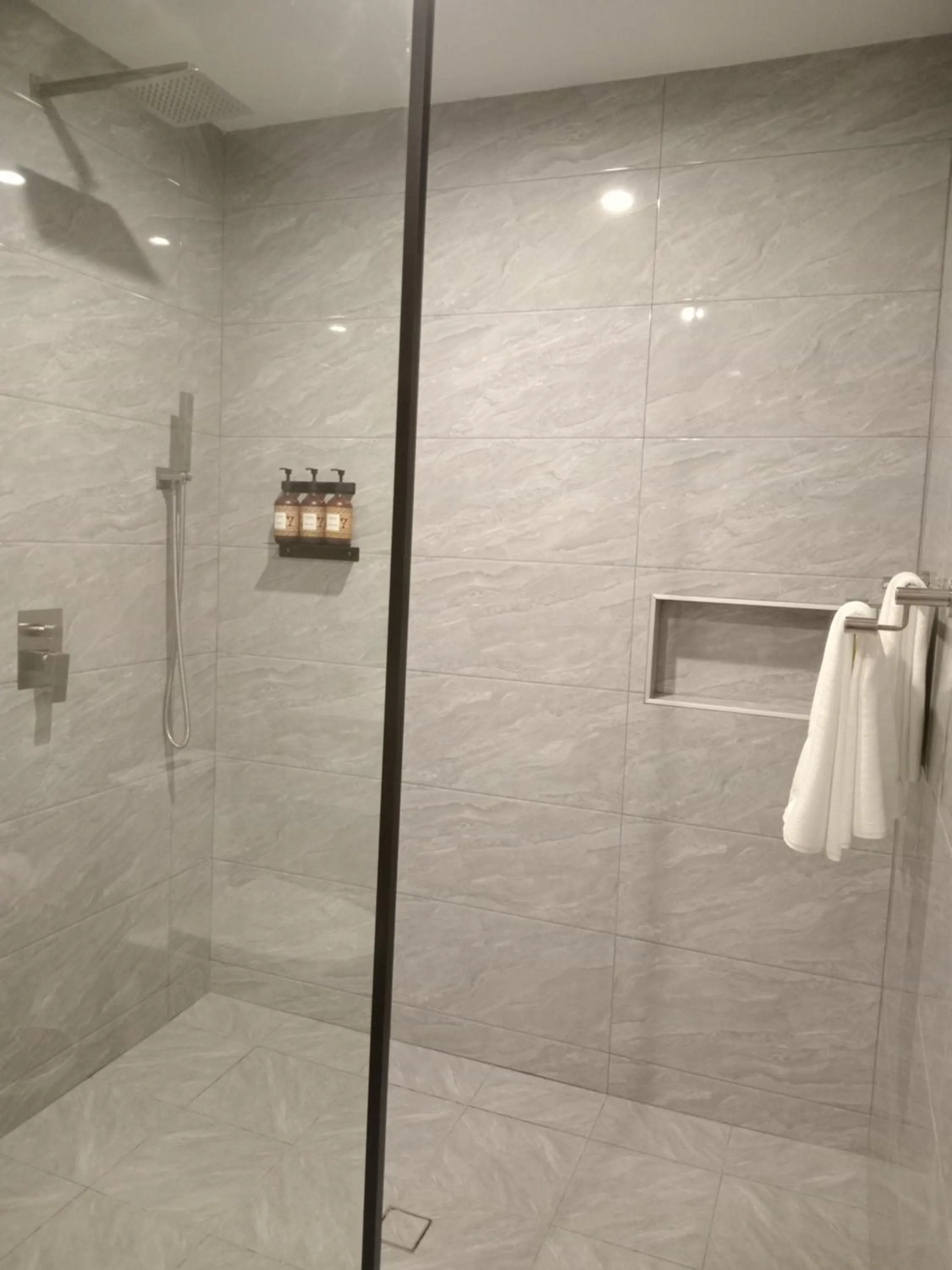 Bathroom in Hibiscus Suites And Residences