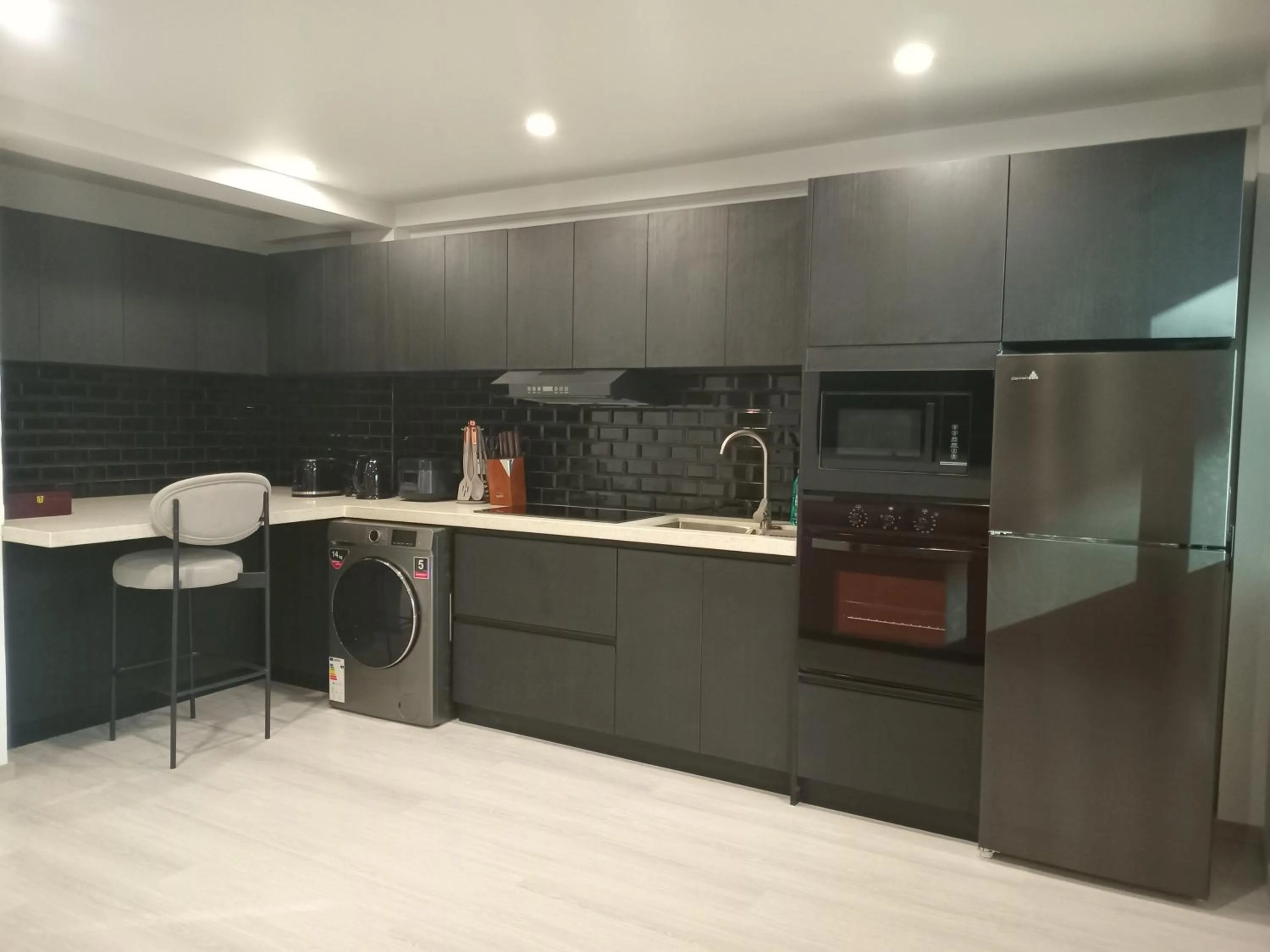 kitchen in Hibiscus Suites And Residences