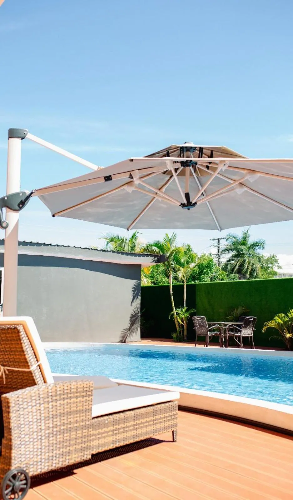 Swimming pool in Hibiscus Suites And Residences