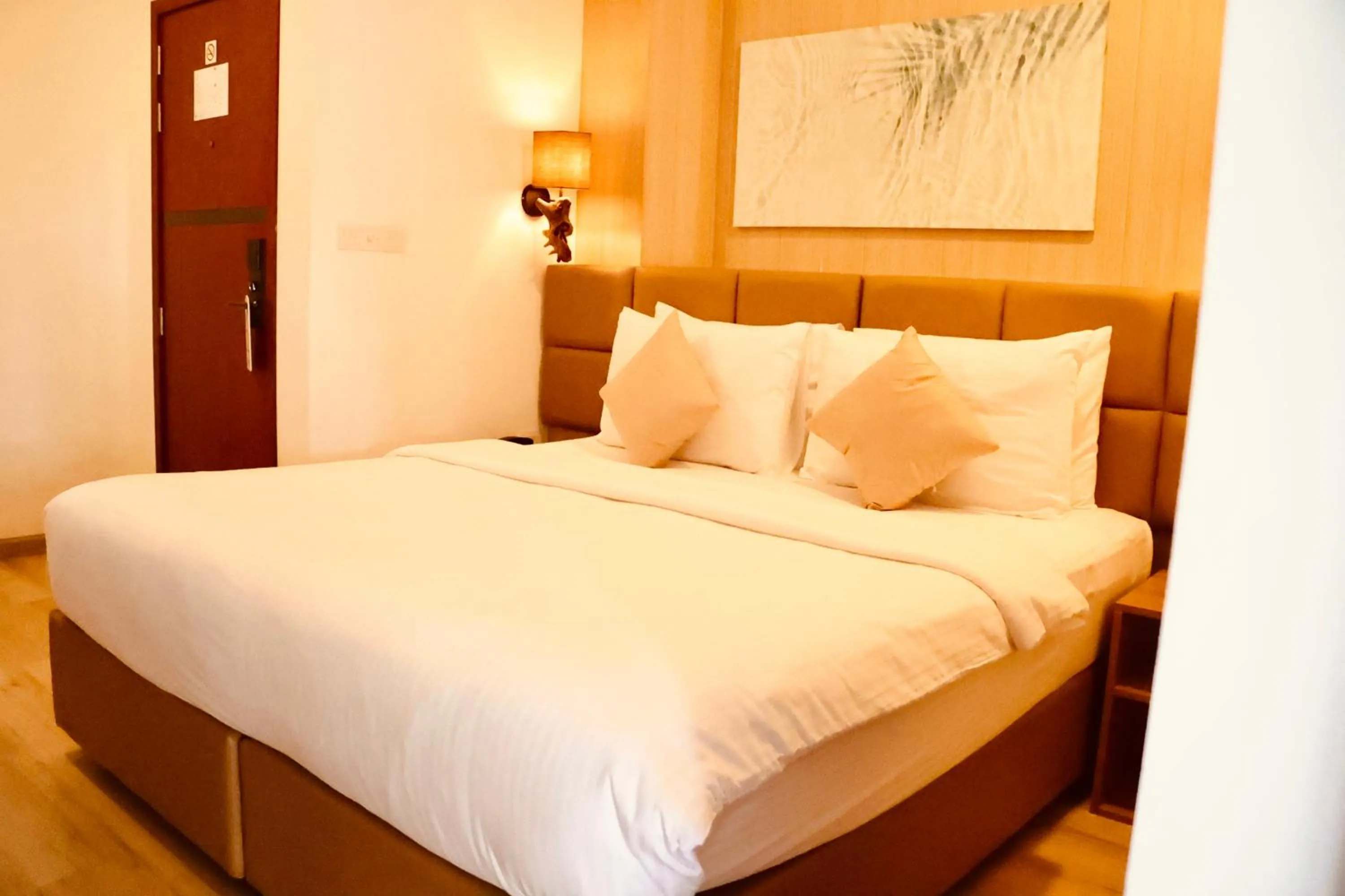 Bed in Cocomo Maldives