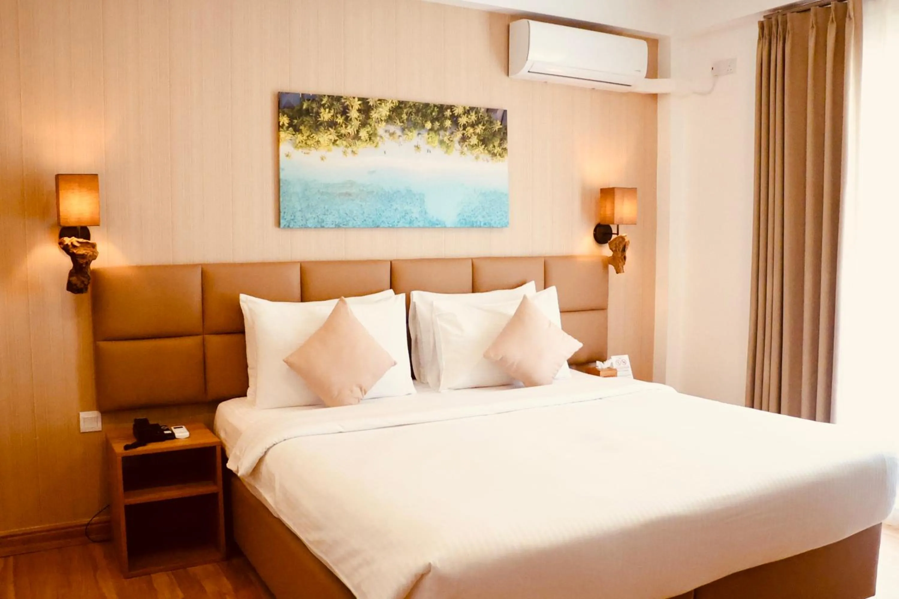 Bed in Cocomo Maldives