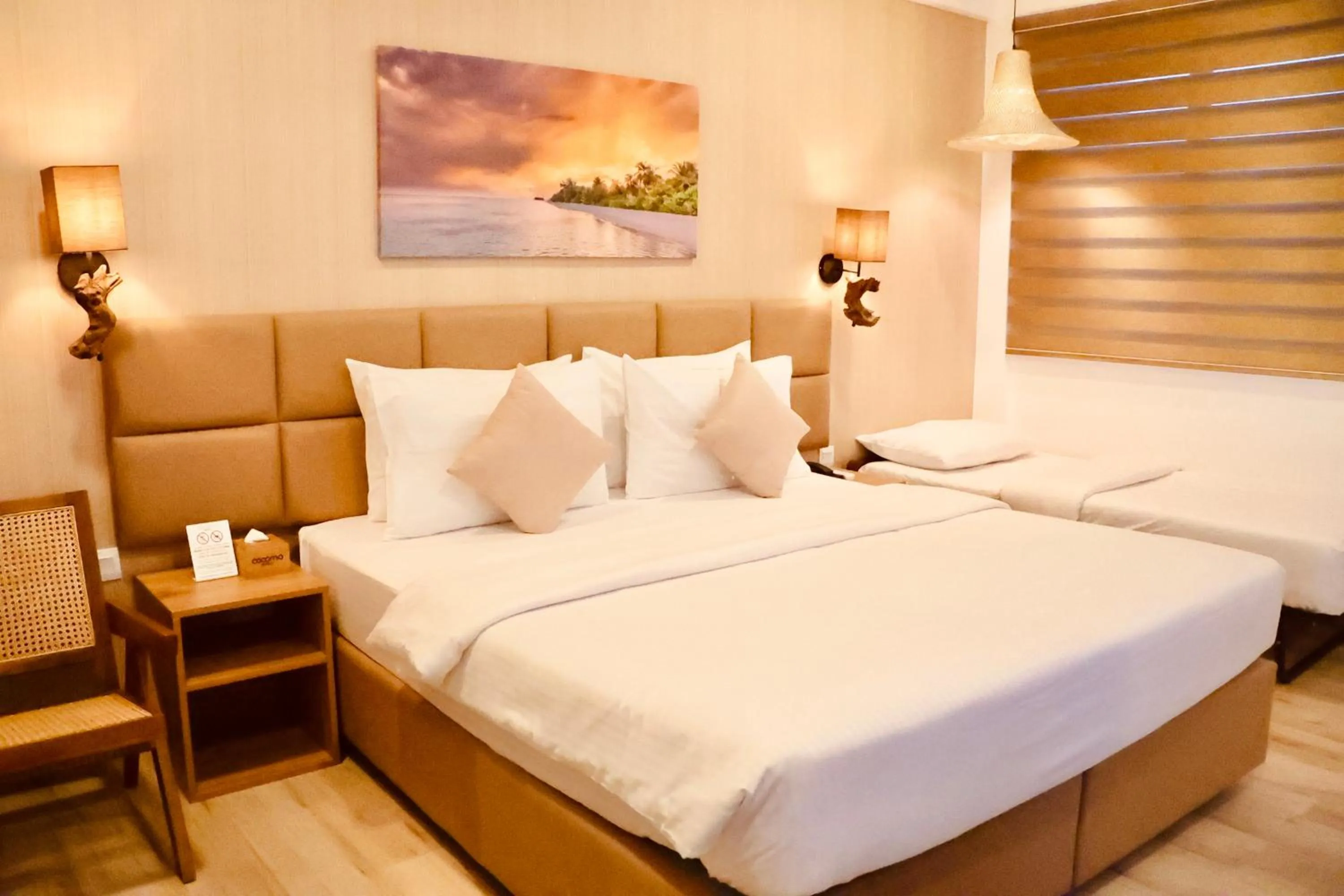 Bed in Cocomo Maldives