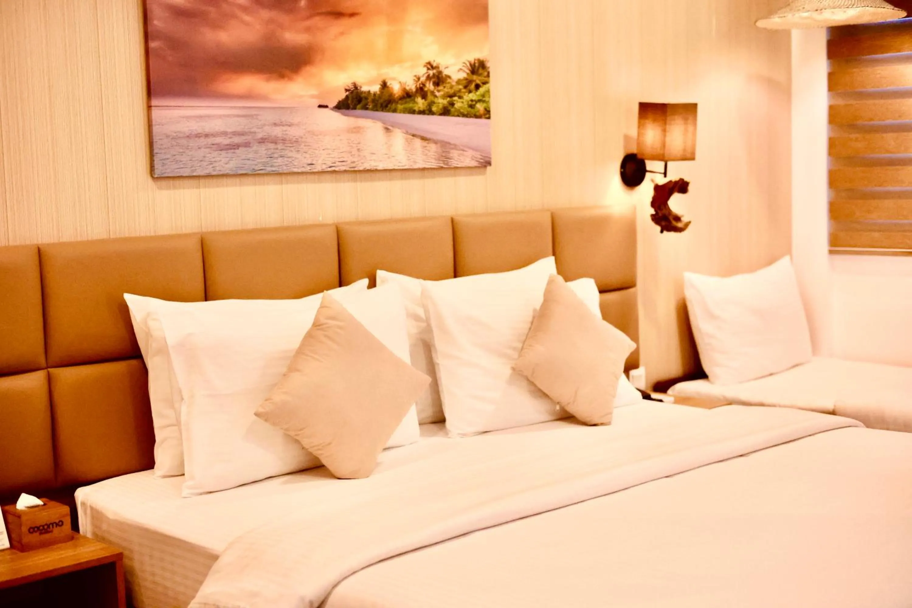 Bed in Cocomo Maldives