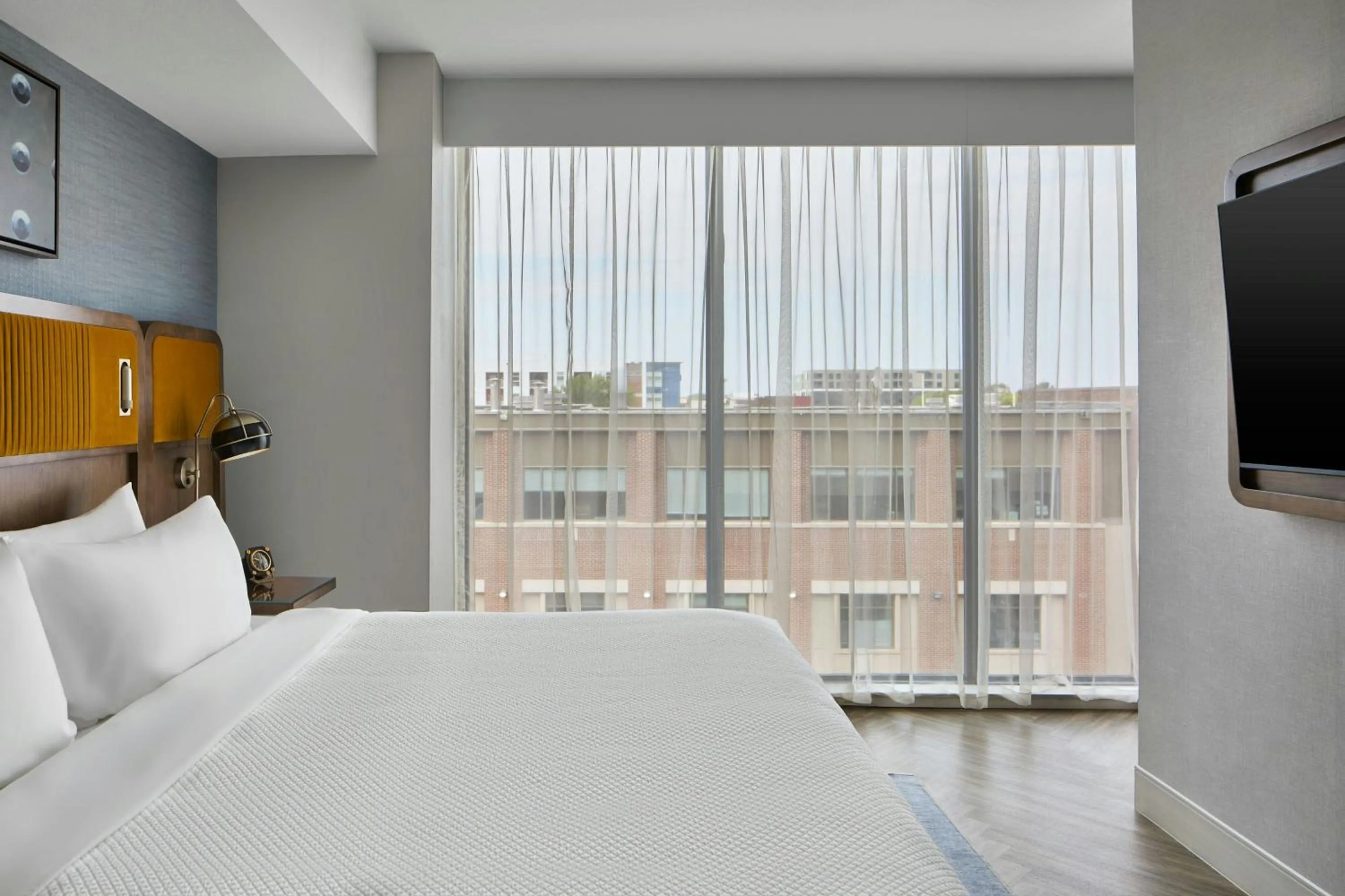 Bedroom, Bed in The Olive Ann Hotel, Grand Forks, a Tribute Portfolio Hotel