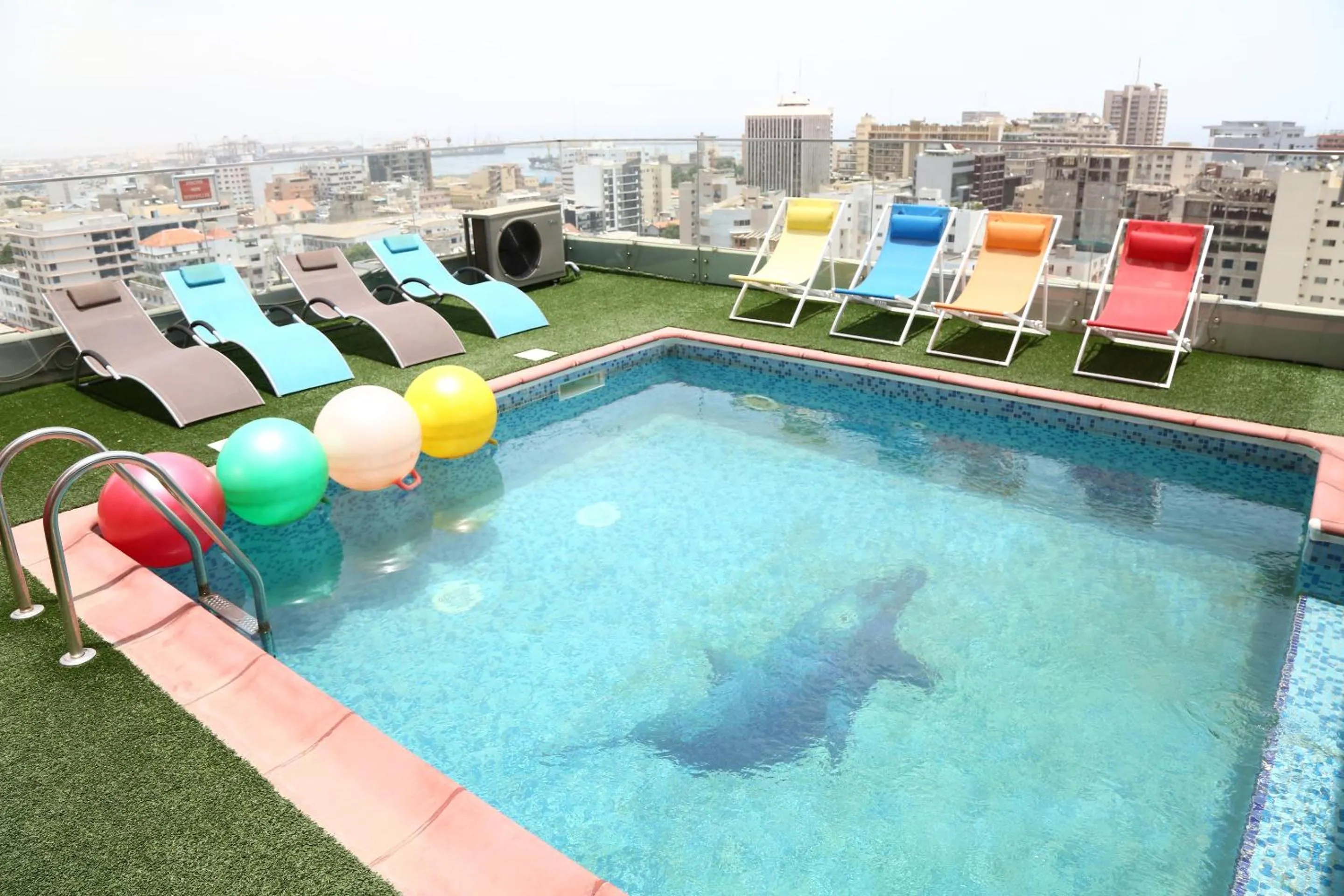 Swimming pool in Hôtel Fleur de Lys Plateau