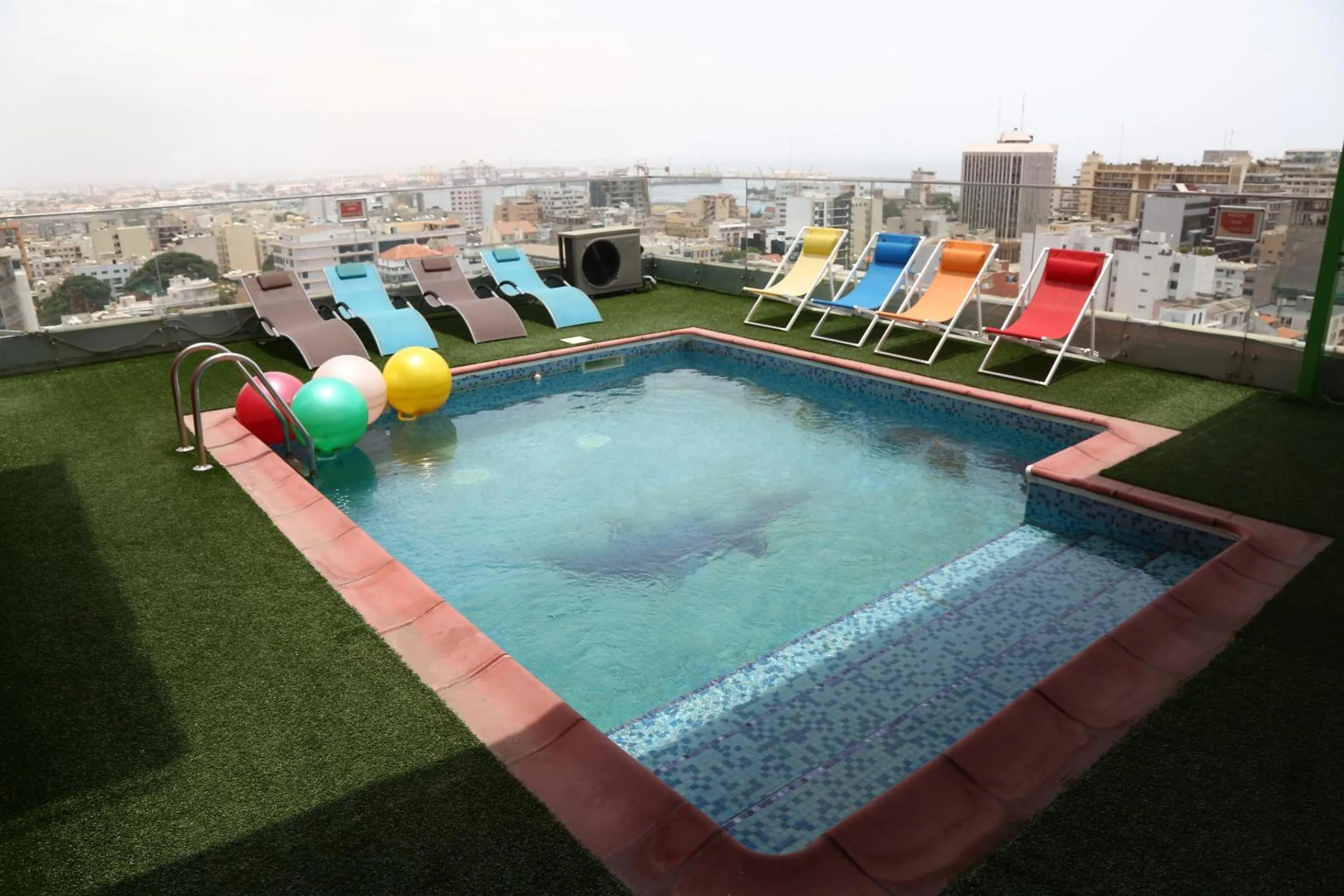 Swimming pool in Hôtel Fleur de Lys Plateau