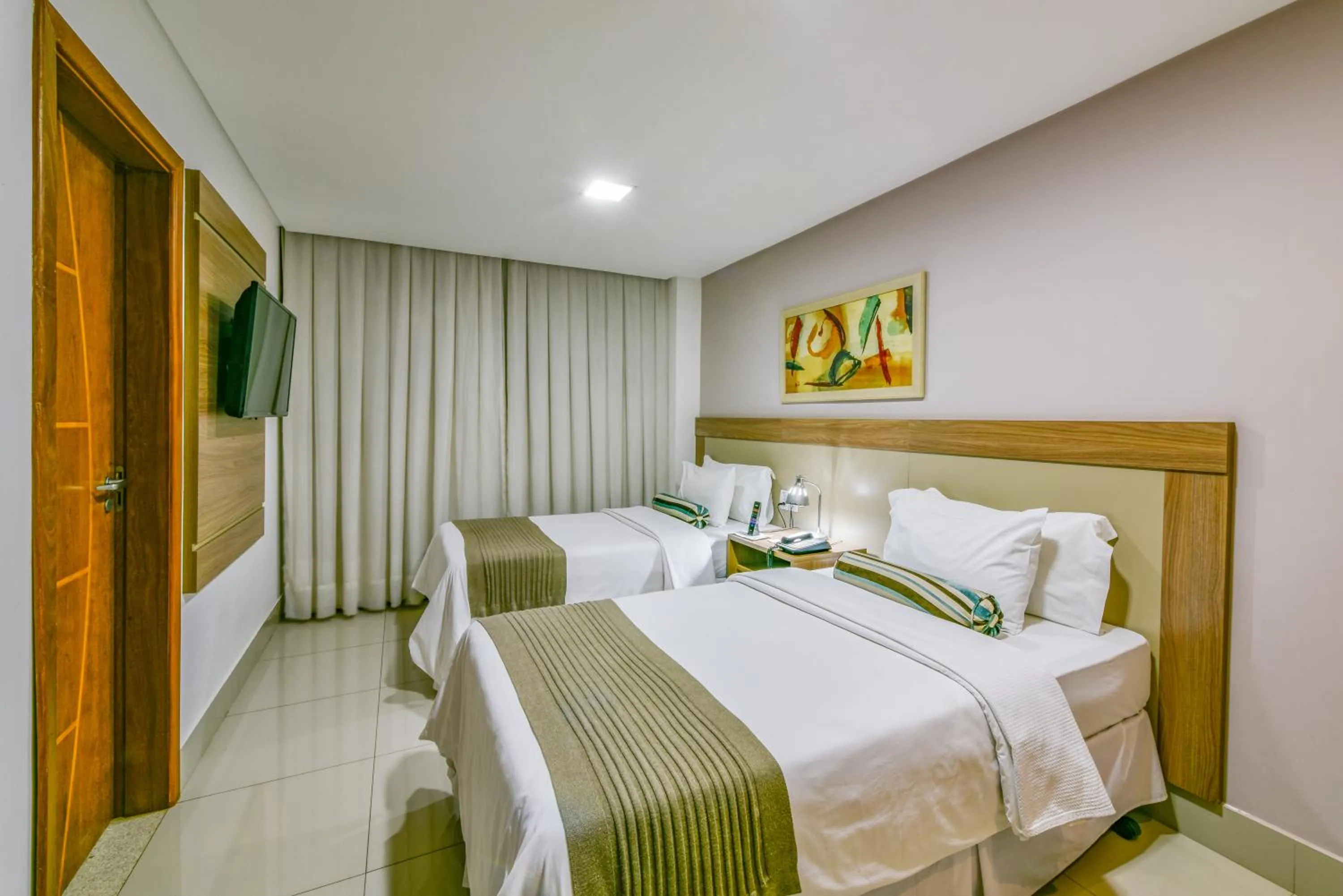 Bedroom, Bed in Plaza Inn Breeze Aeroporto