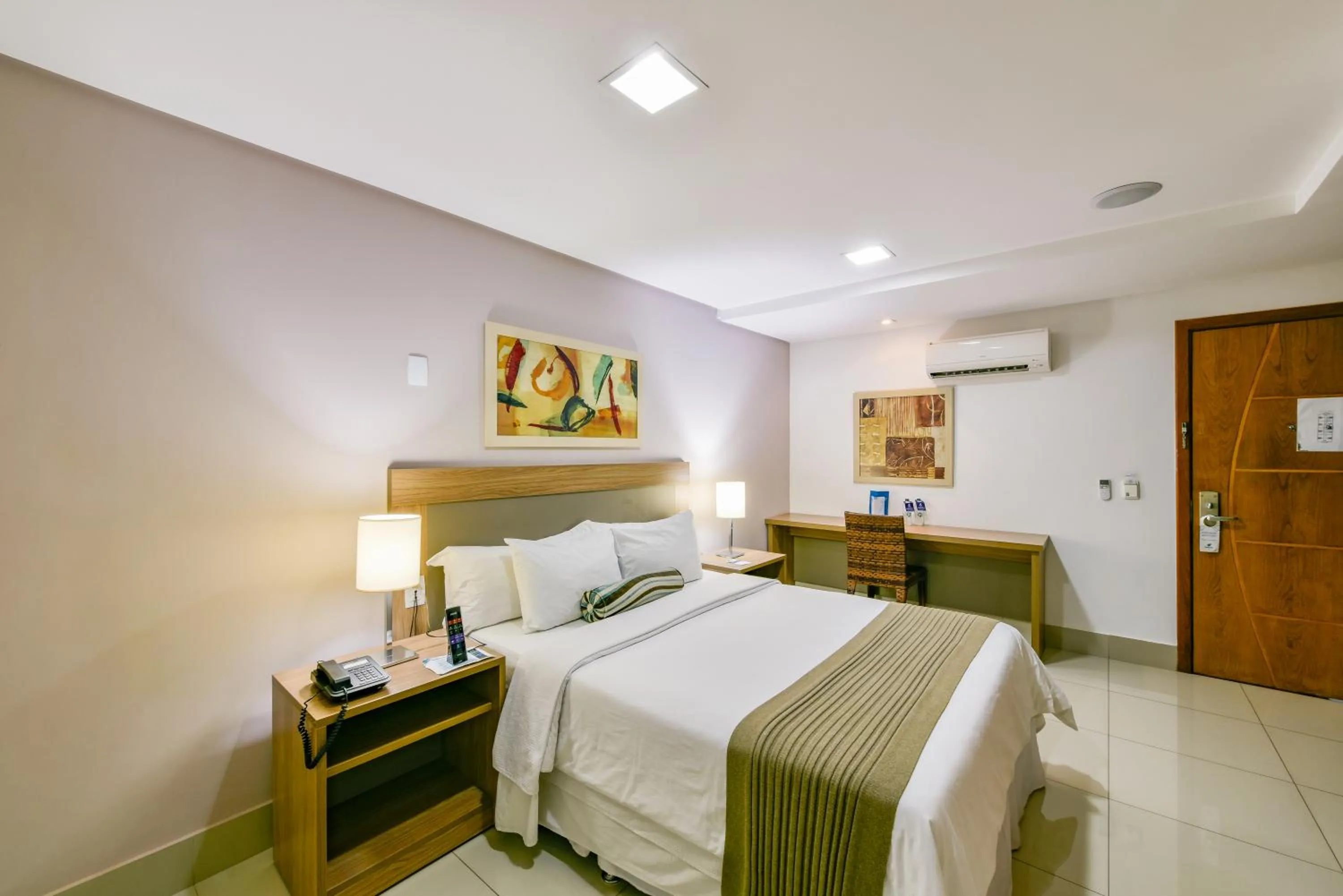 Bed in Plaza Inn Breeze Aeroporto