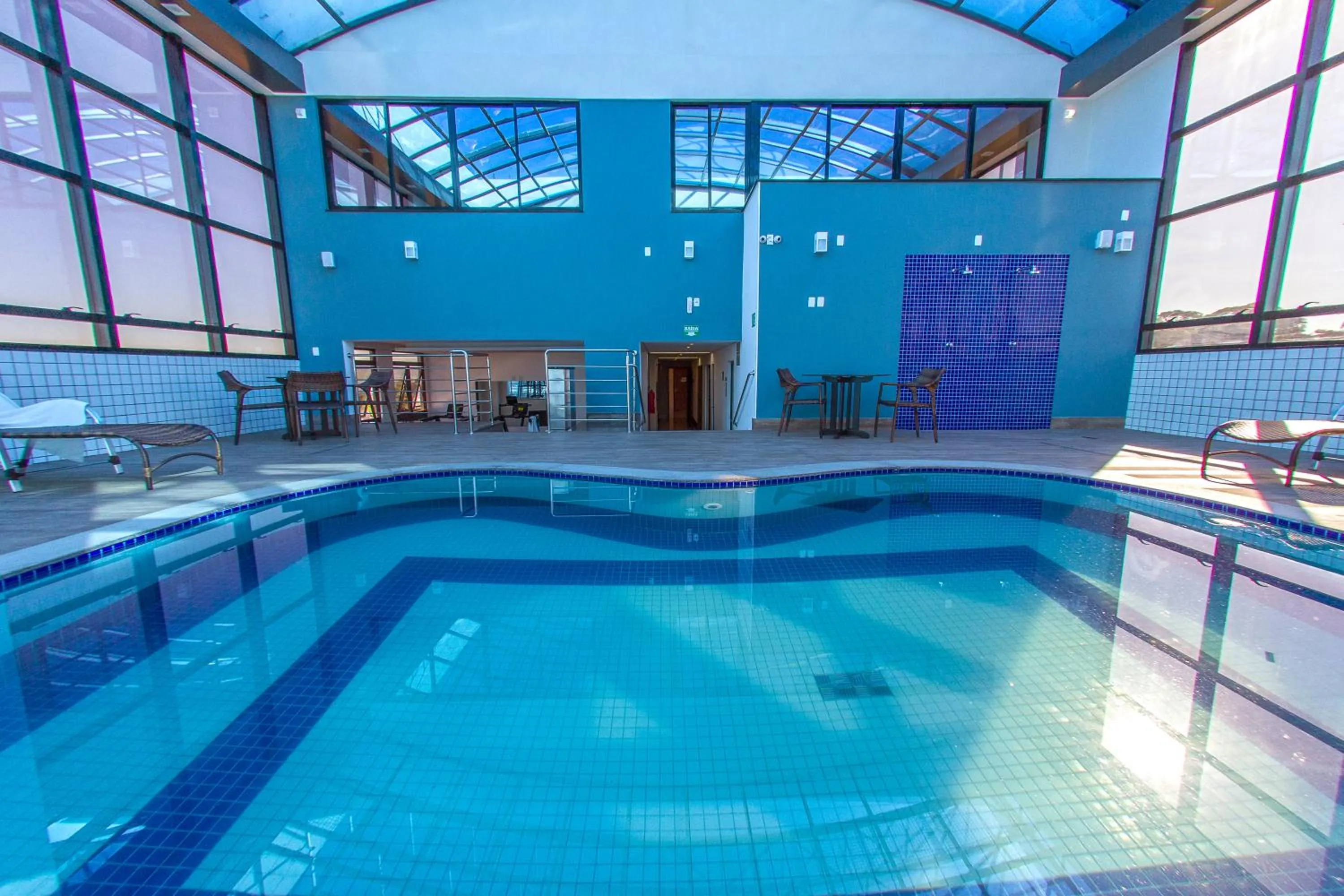 Swimming pool in Plaza Inn Breeze Aeroporto