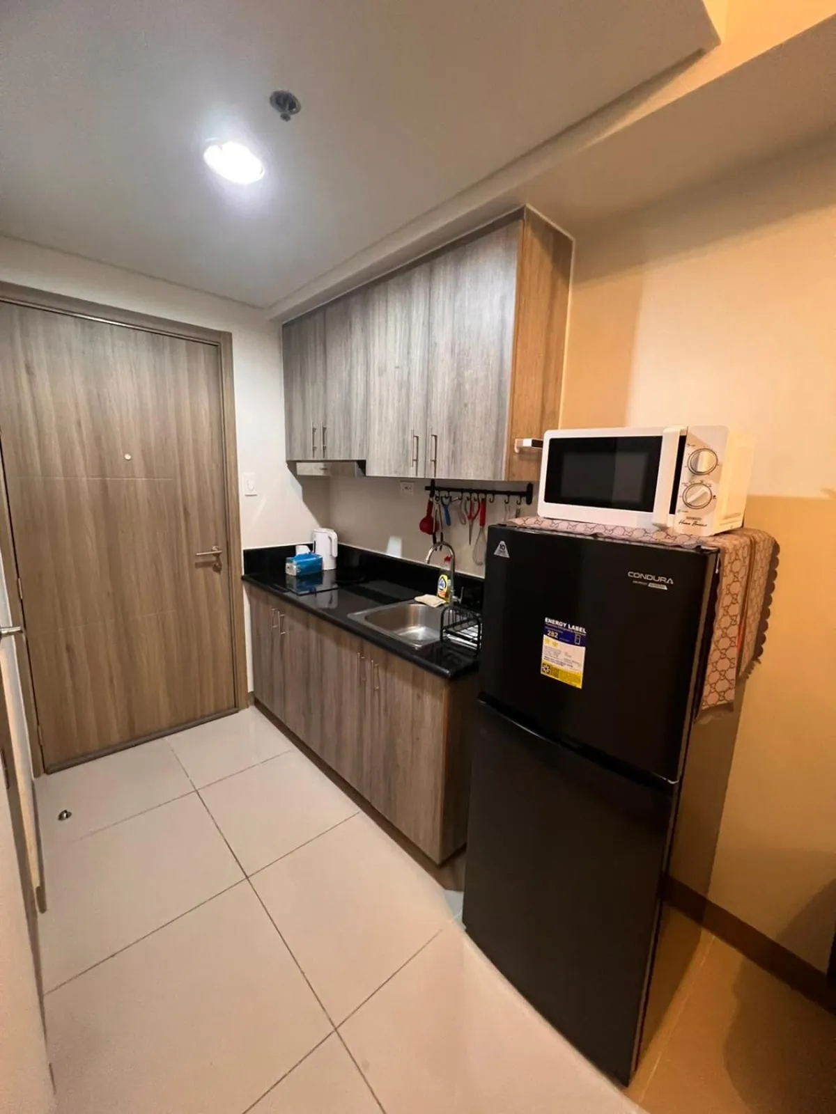 Kitchen or kitchenette in SMDC Coast Residences
