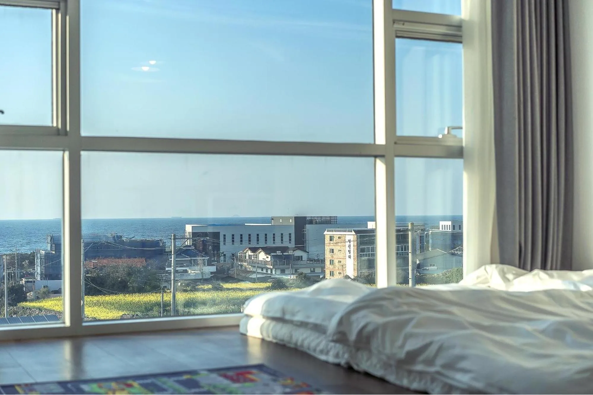 Property building, Bed in Jeju Sky Kids Pension