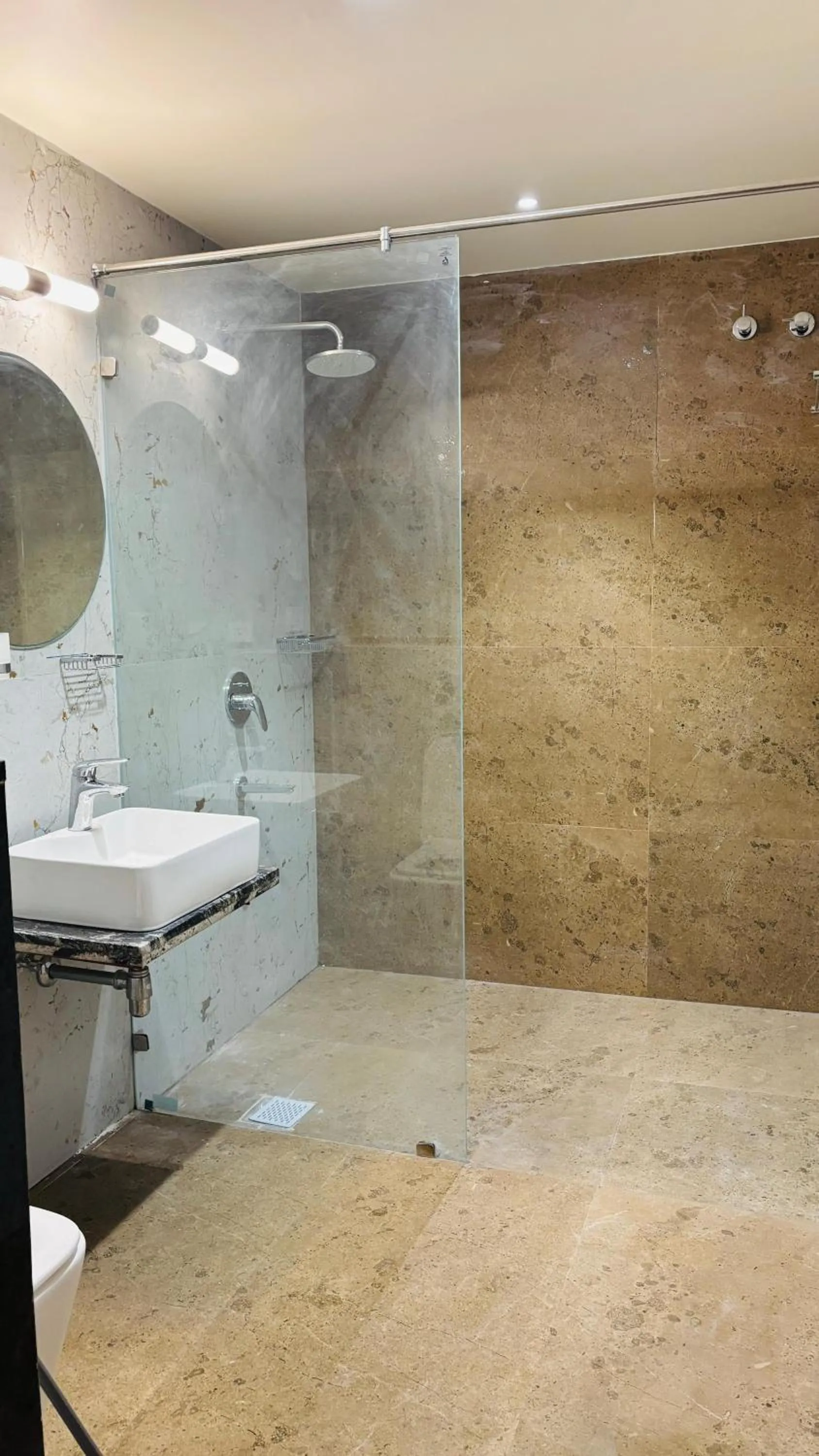 Bathroom in MK Naidu Hotel &Conventions Center