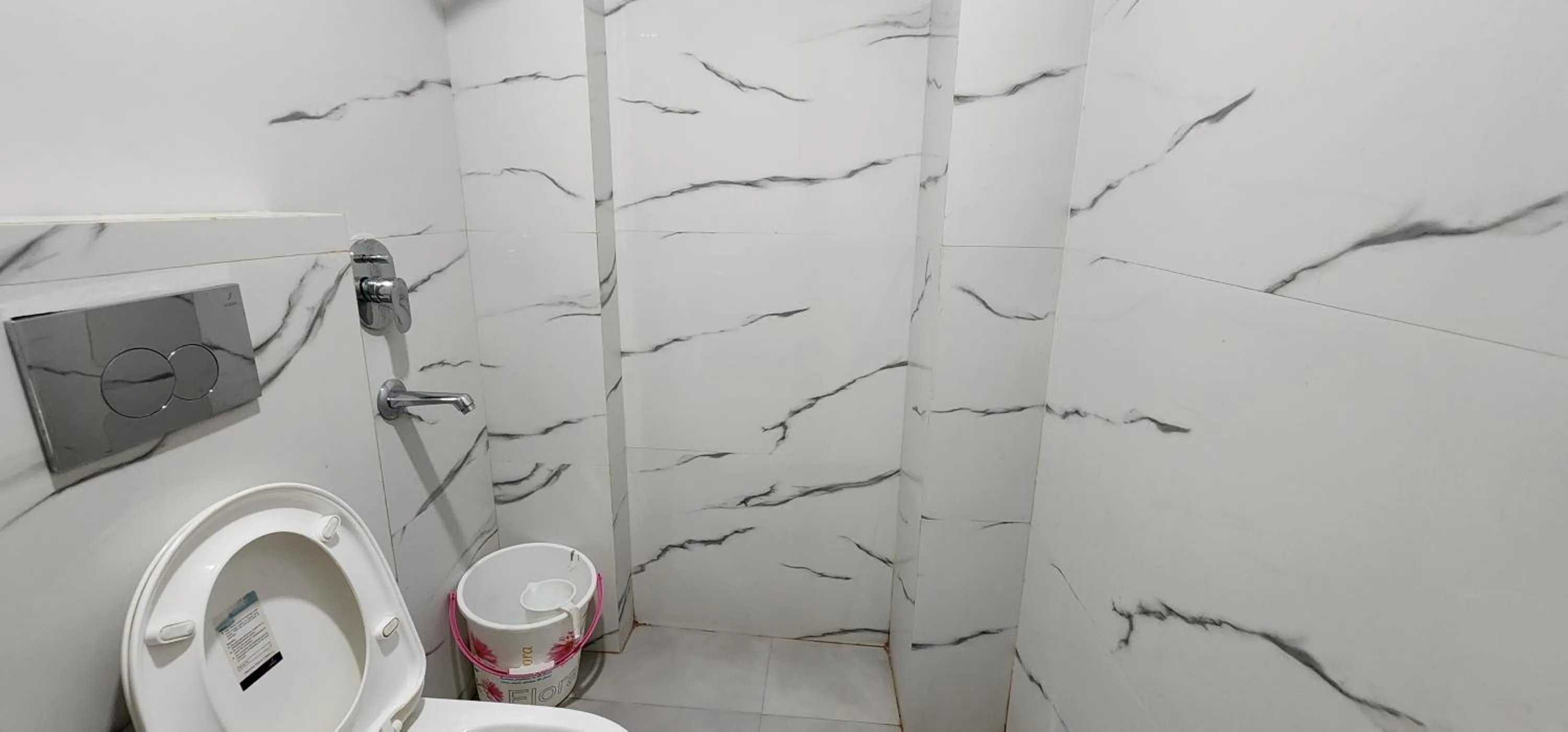 Bathroom in Hotel Shree Sai Dham