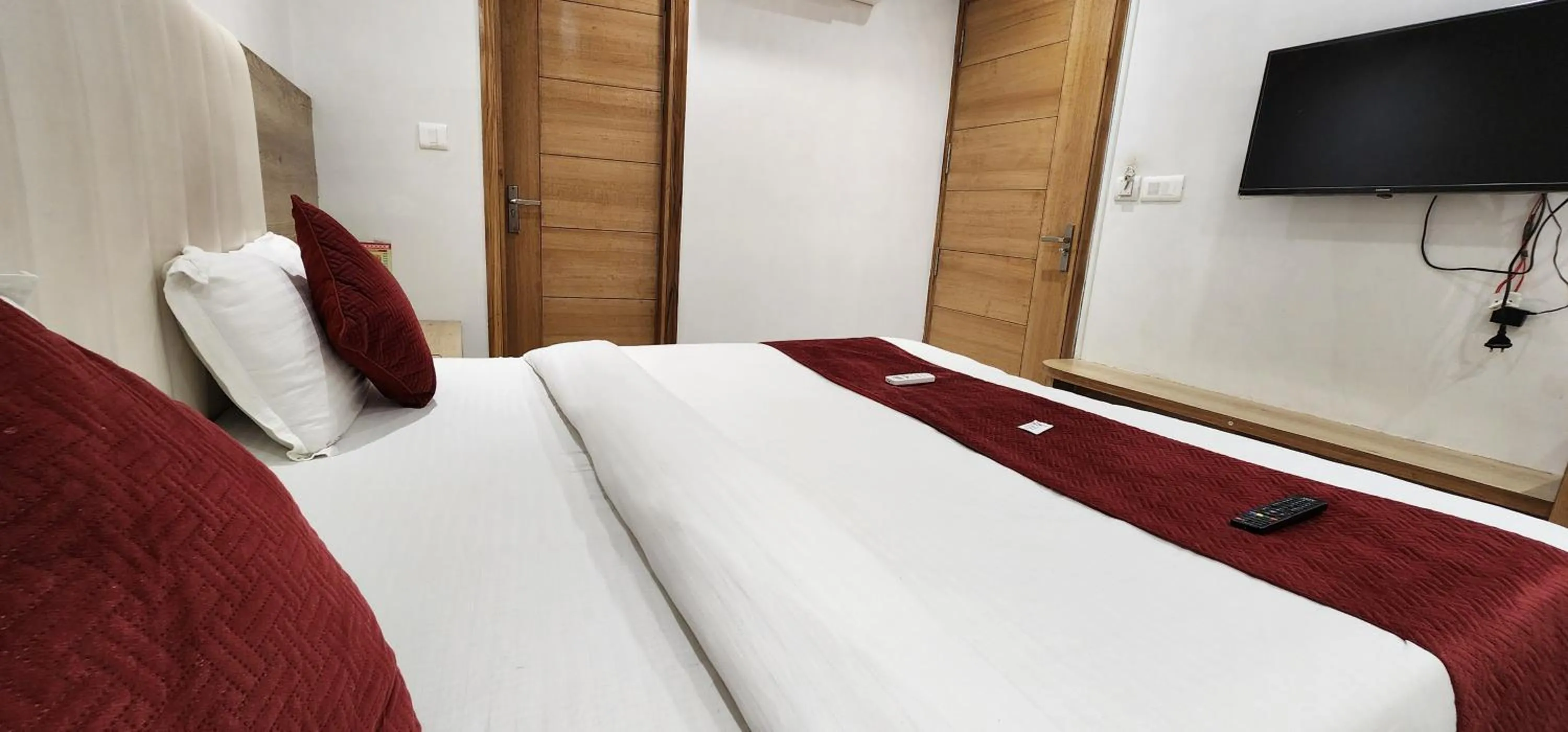 Bed in Hotel Shree Sai Dham