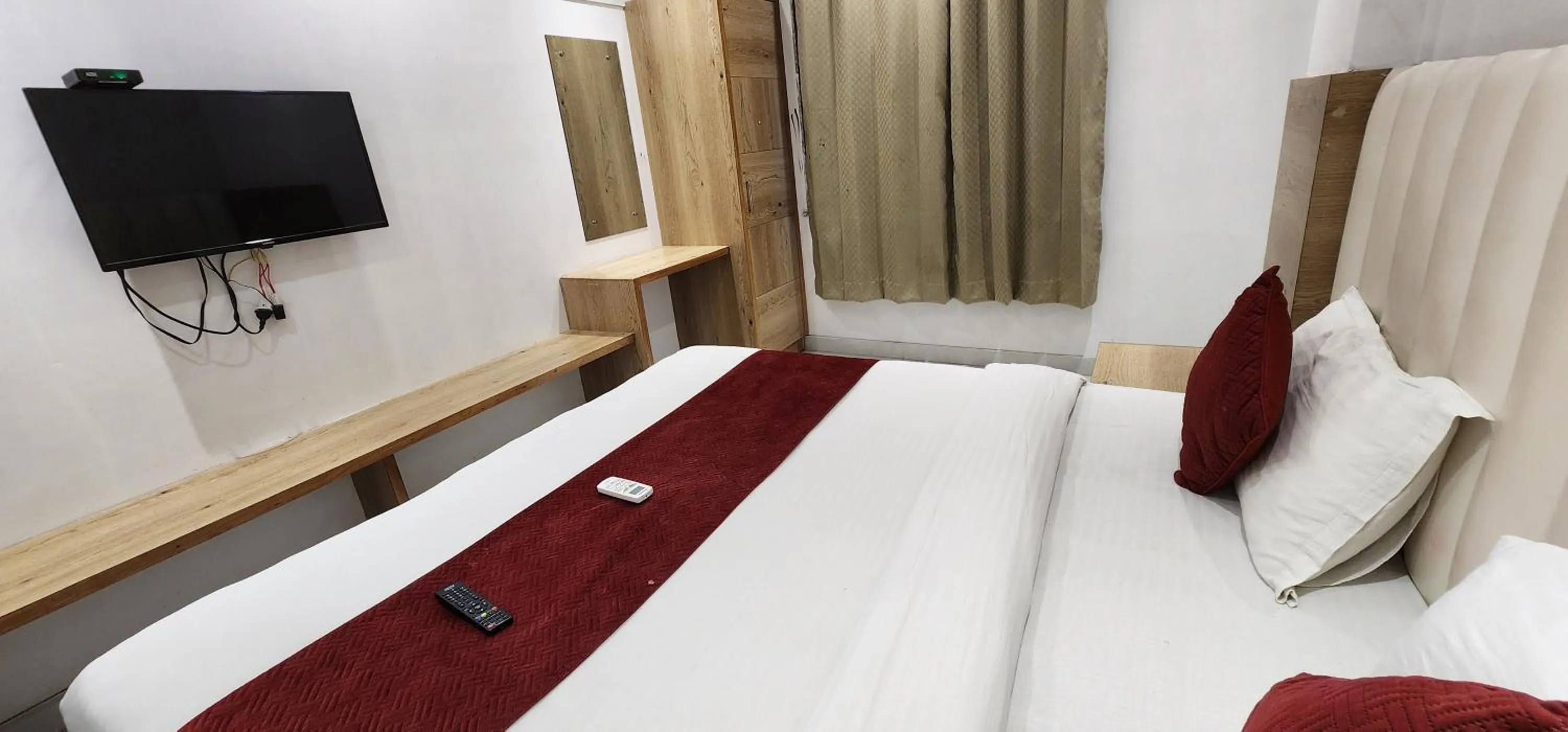 Bed in Hotel Shree Sai Dham