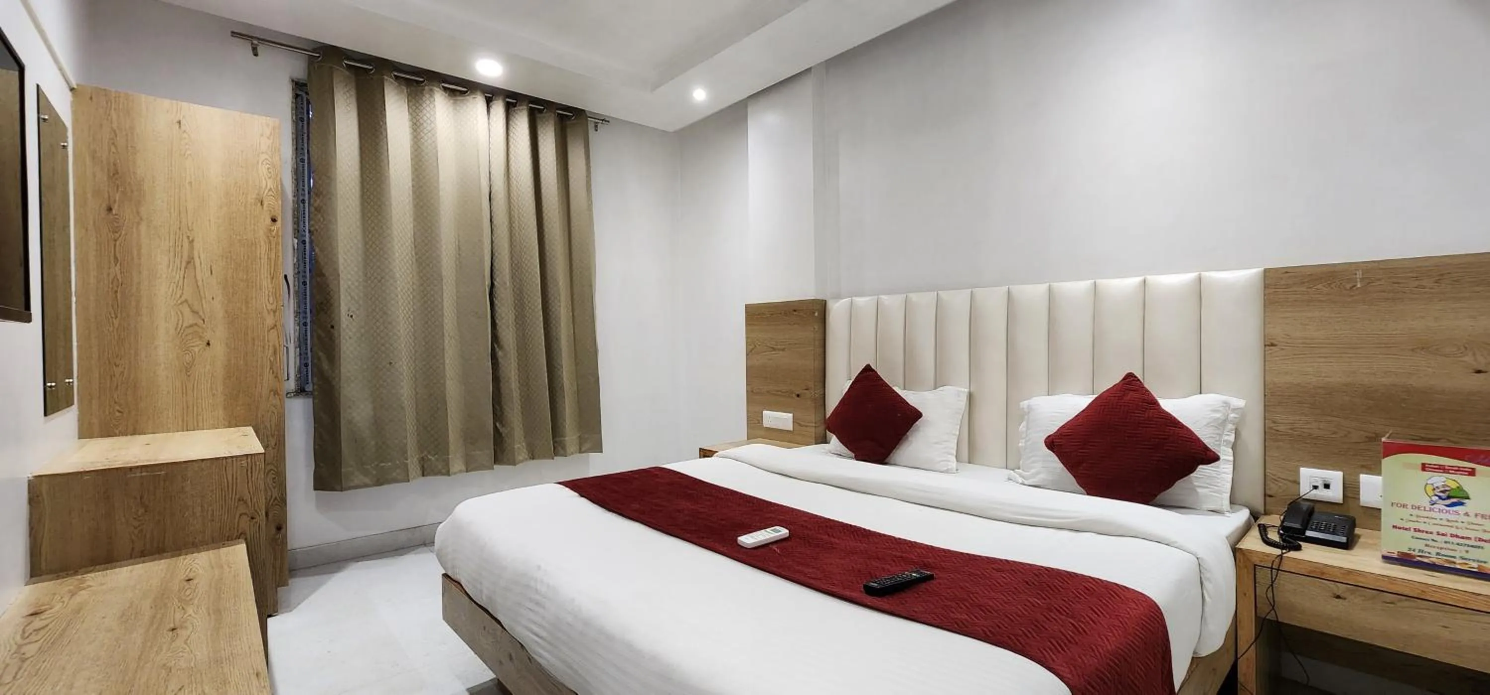 Bed in Hotel Shree Sai Dham