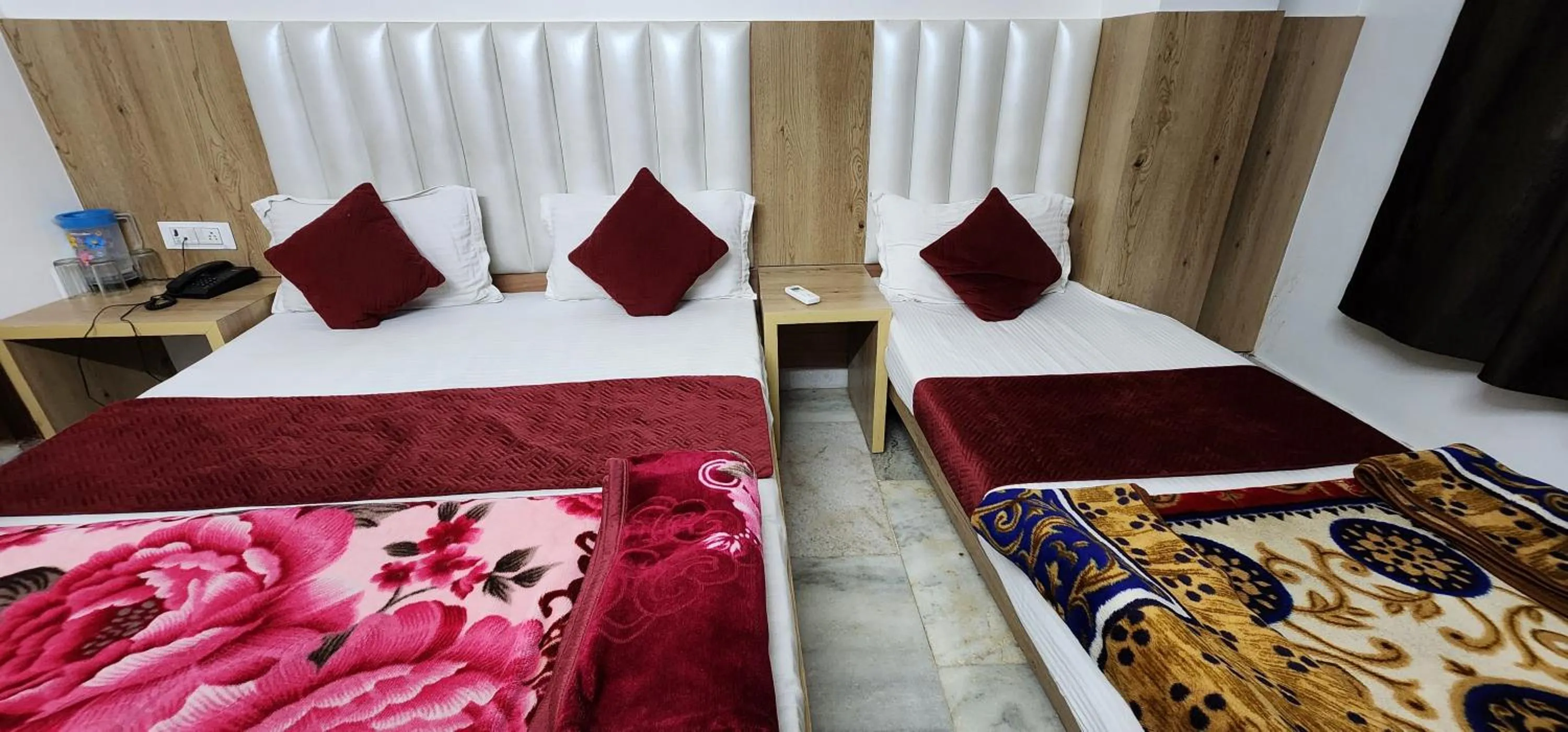 Bed in Hotel Shree Sai Dham