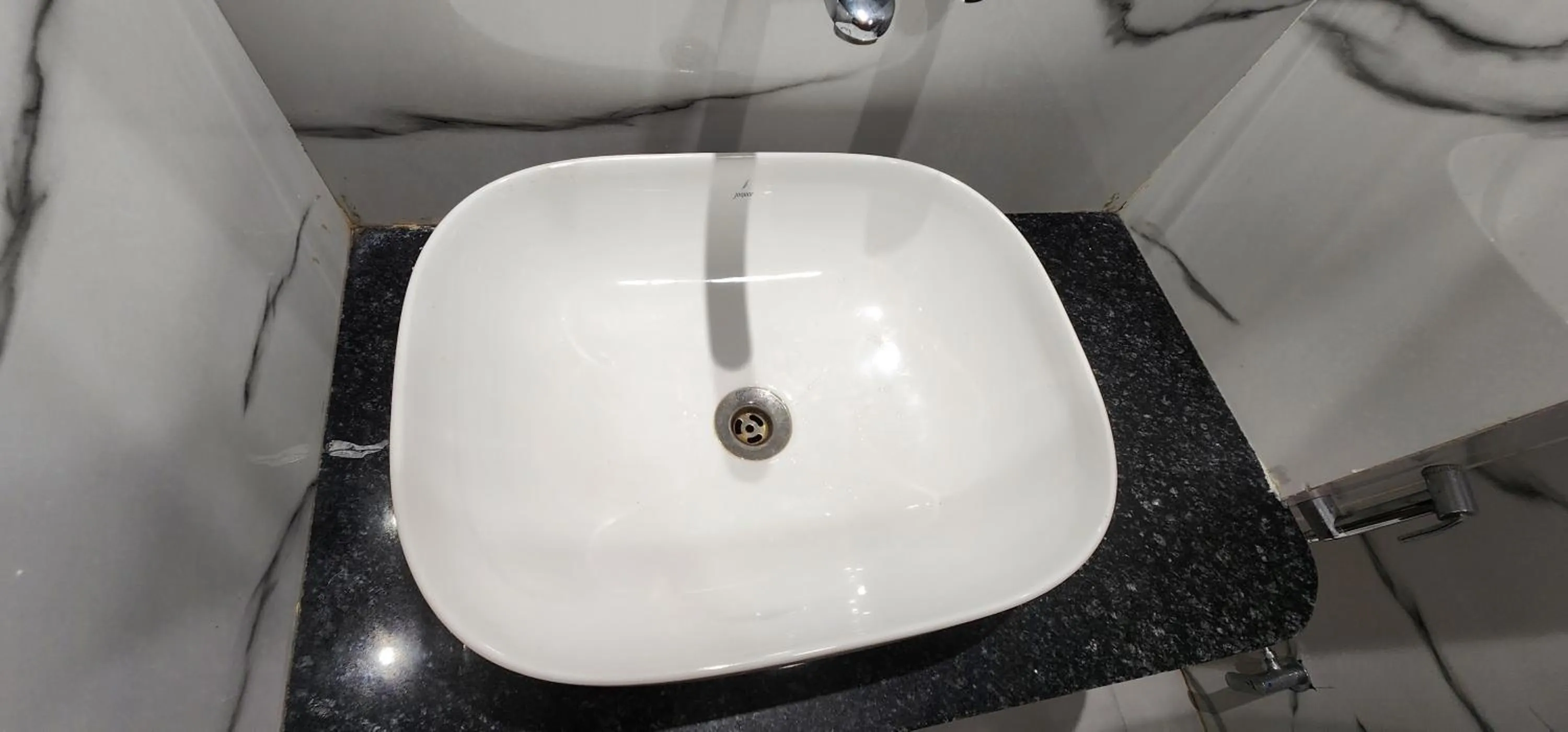 Bathroom in Hotel Shree Sai Dham