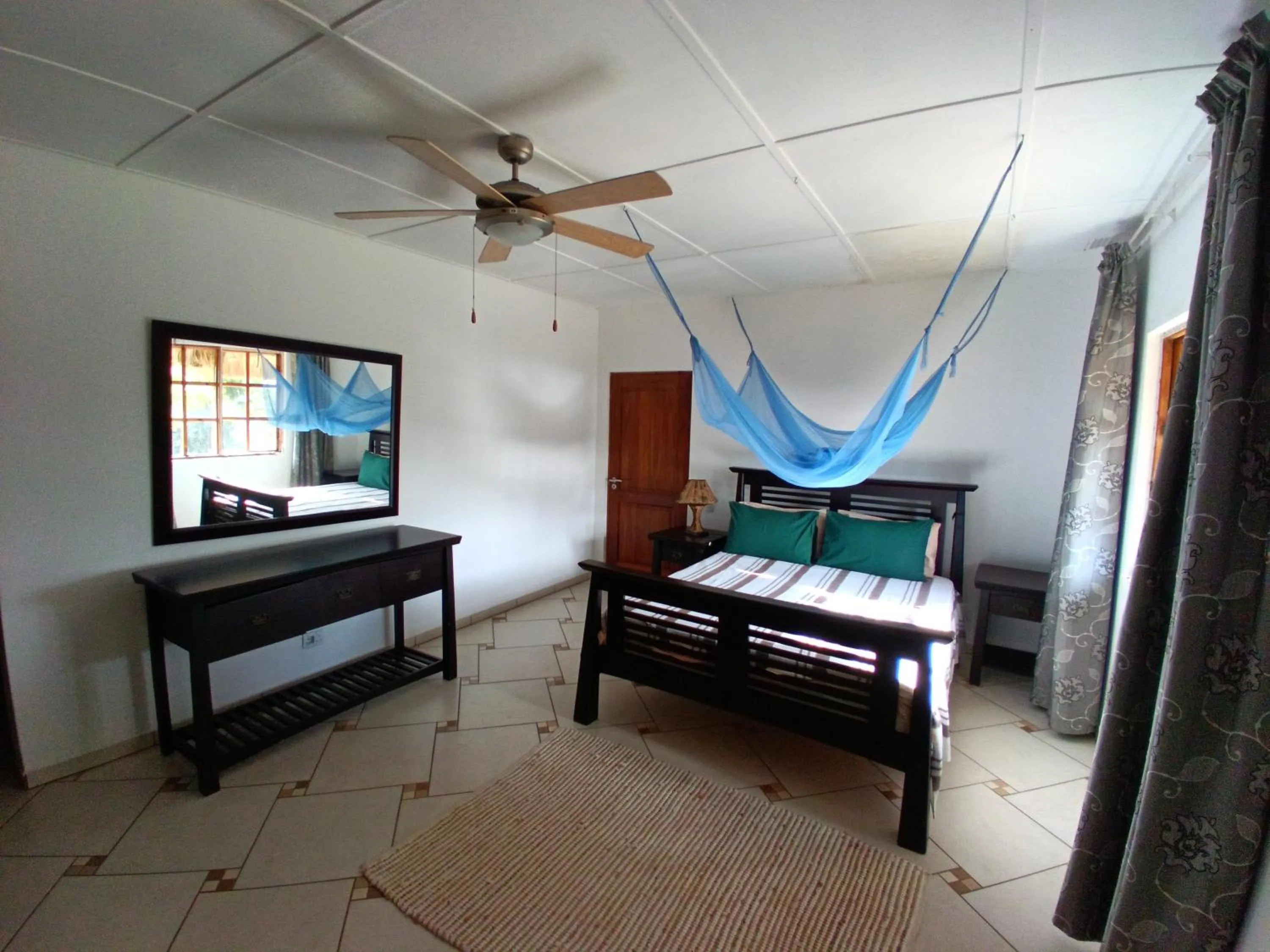 Bed in Blue Moon Beach Holiday Resort