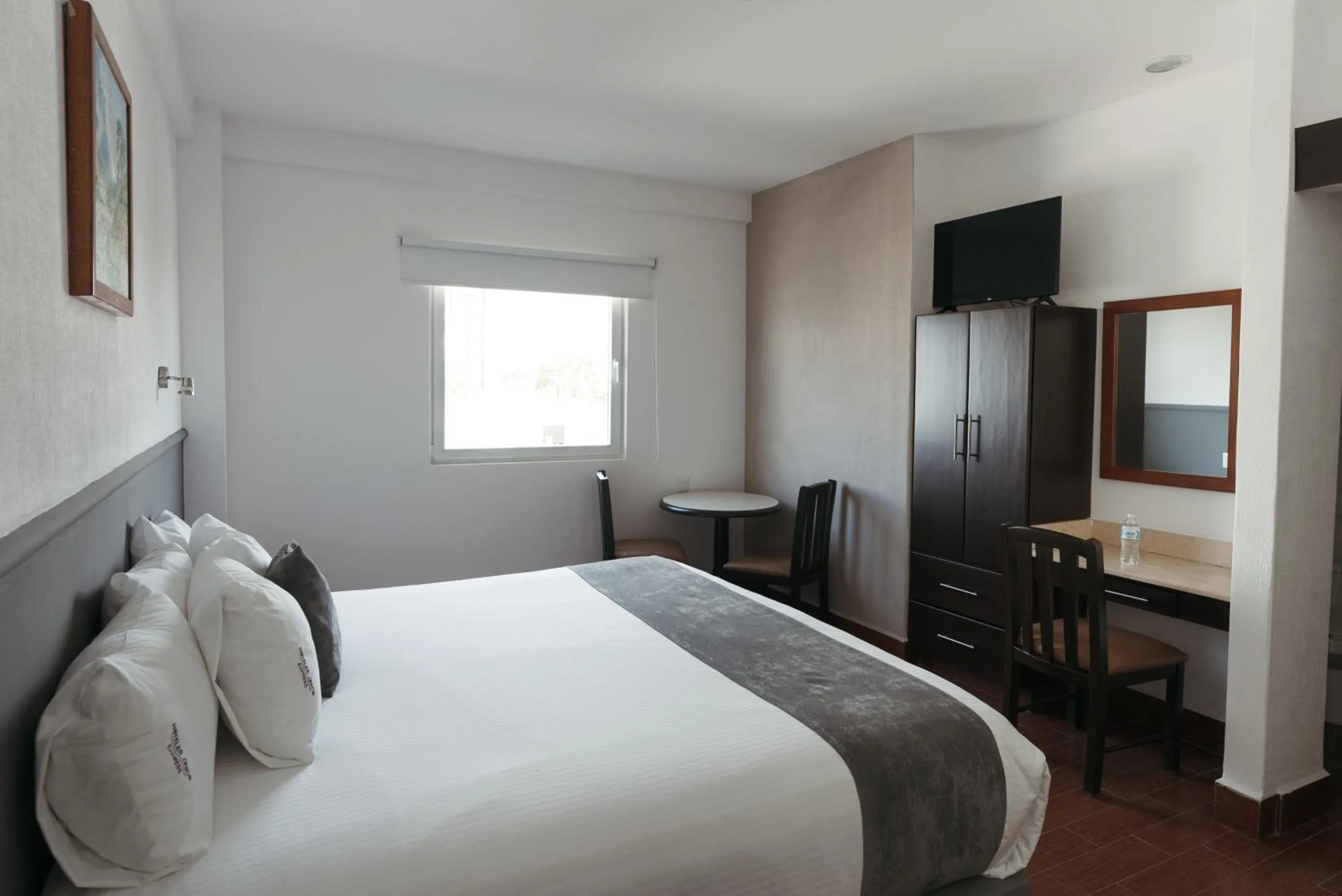 Toilet, Bed in Hoteles Unico Express