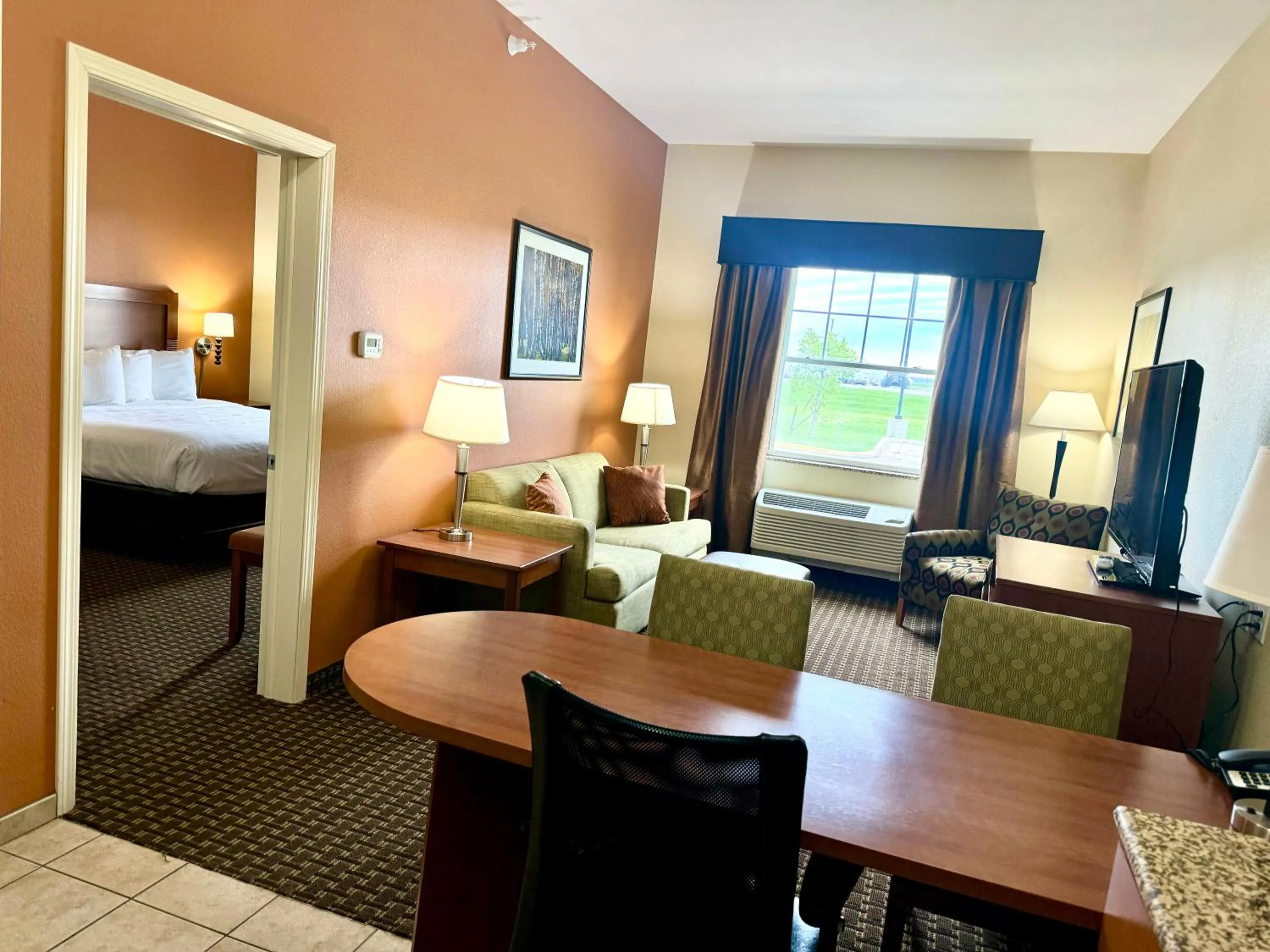 Bed in MainStay Suites Tioga