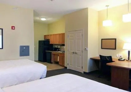 Photo of the whole room, Bed in MainStay Suites Tioga