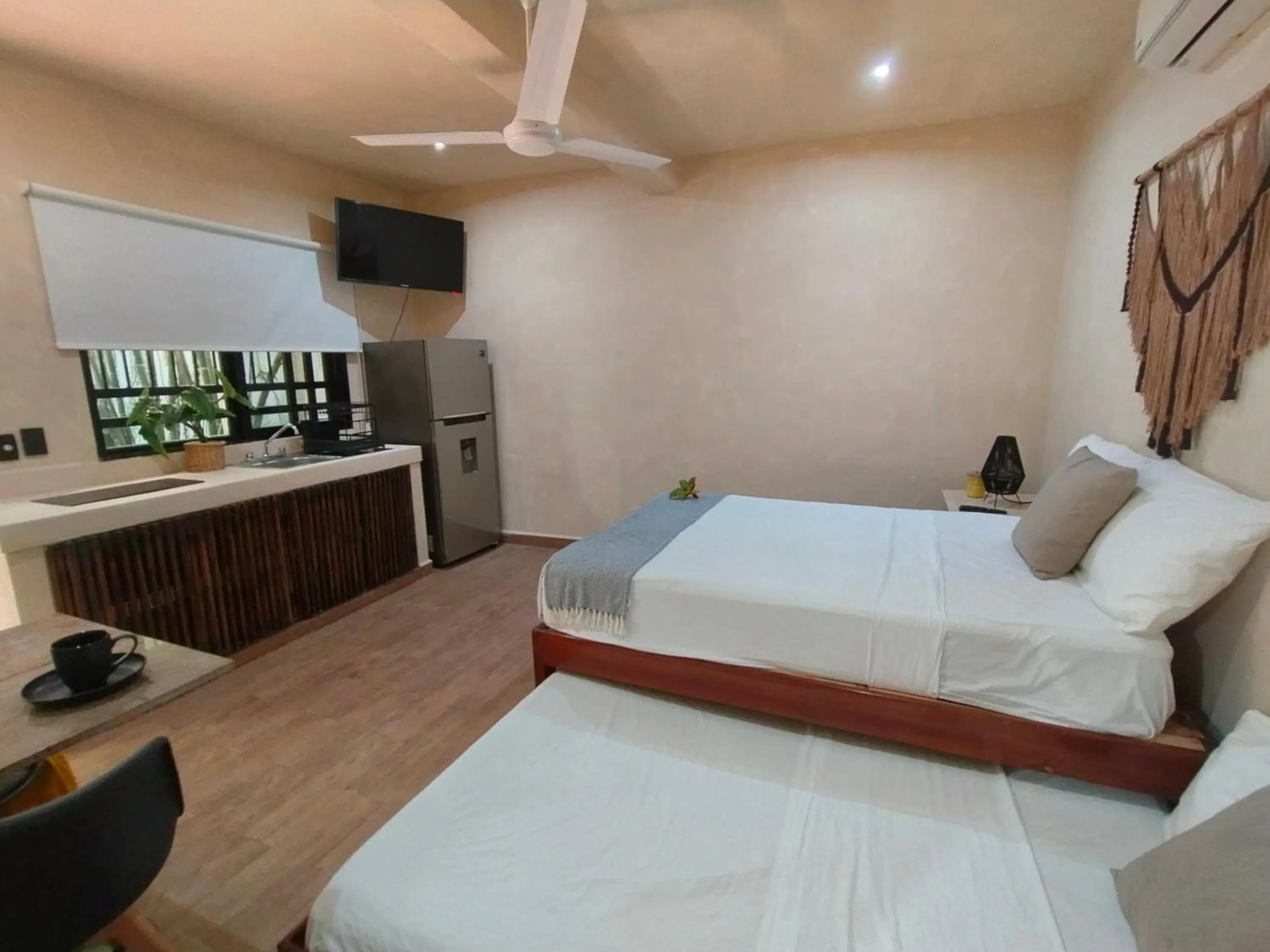 Kitchen or kitchenette, Bed in Casa Lupita