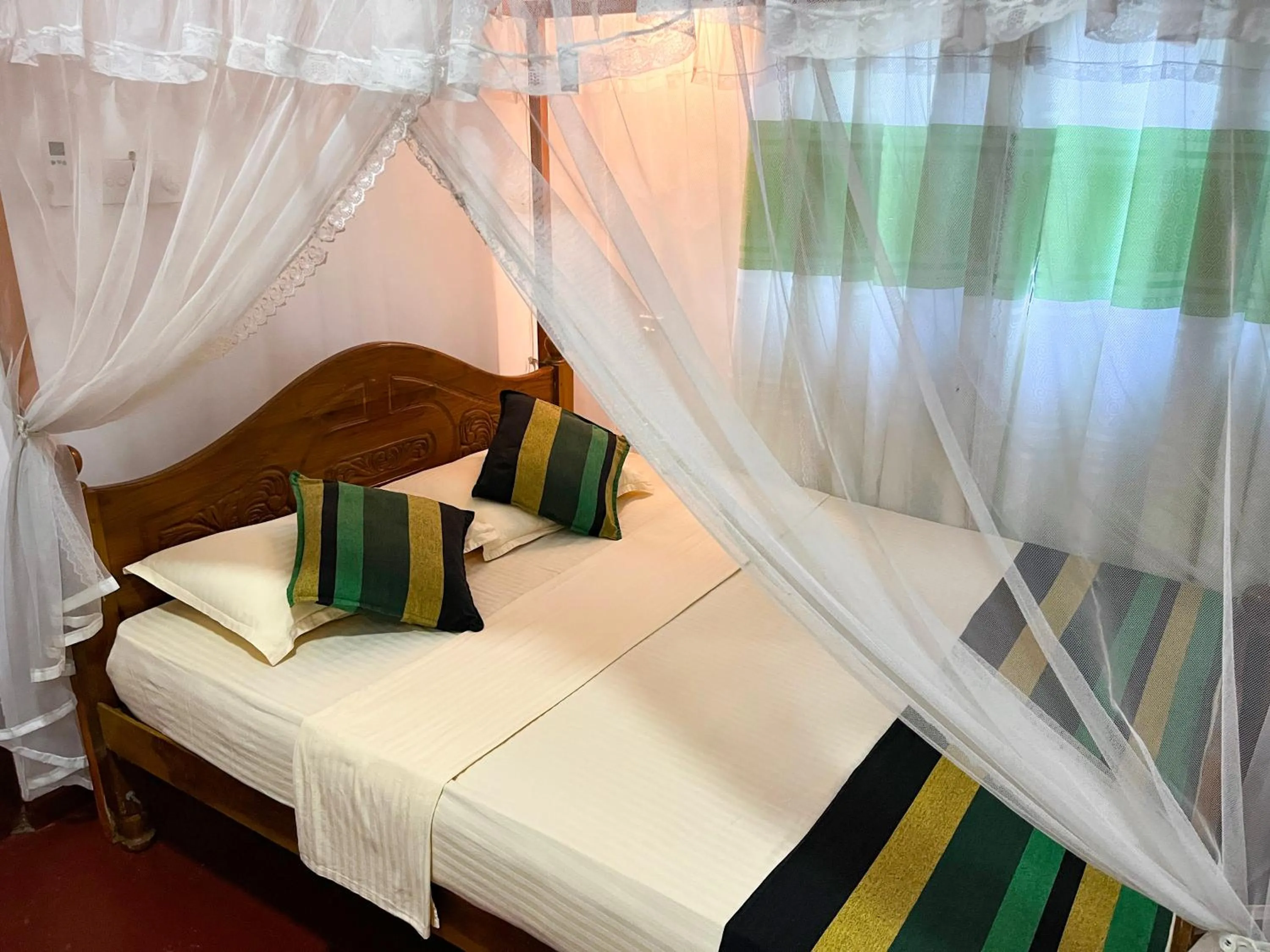 Bed in Damith Tourist Inn