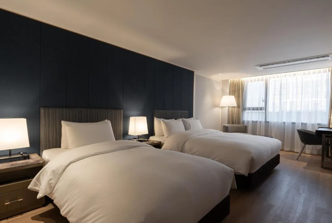 Bed in The May Hotel