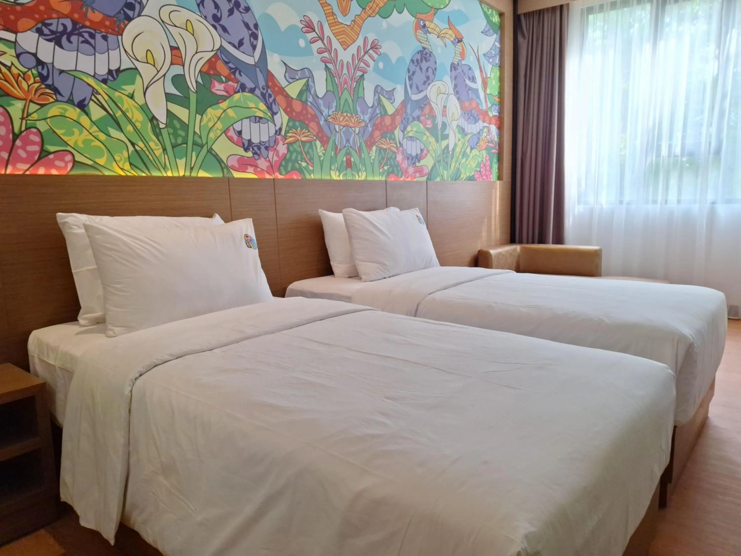 Bed in Alltrue Hotel Palangkaraya
