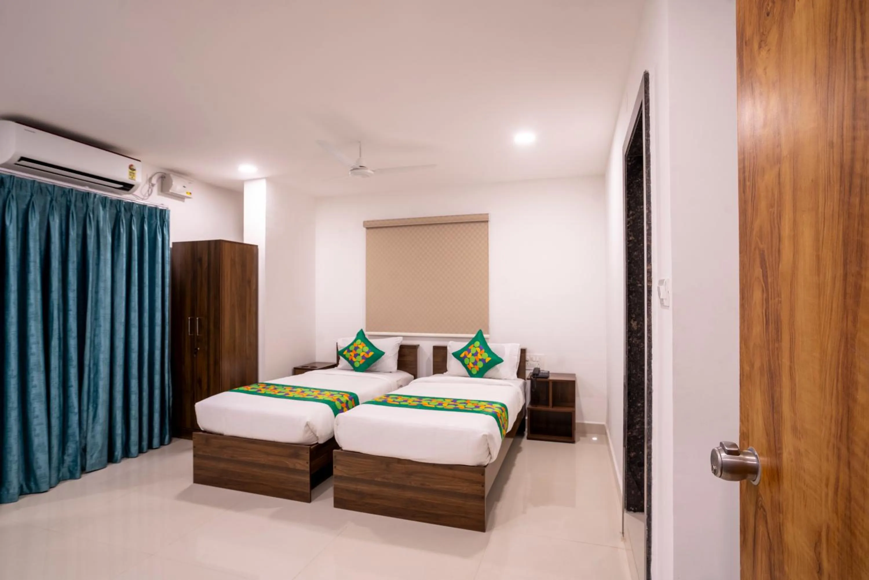 Bedroom, Bed in Treebo De Alphabet Gachibowli
