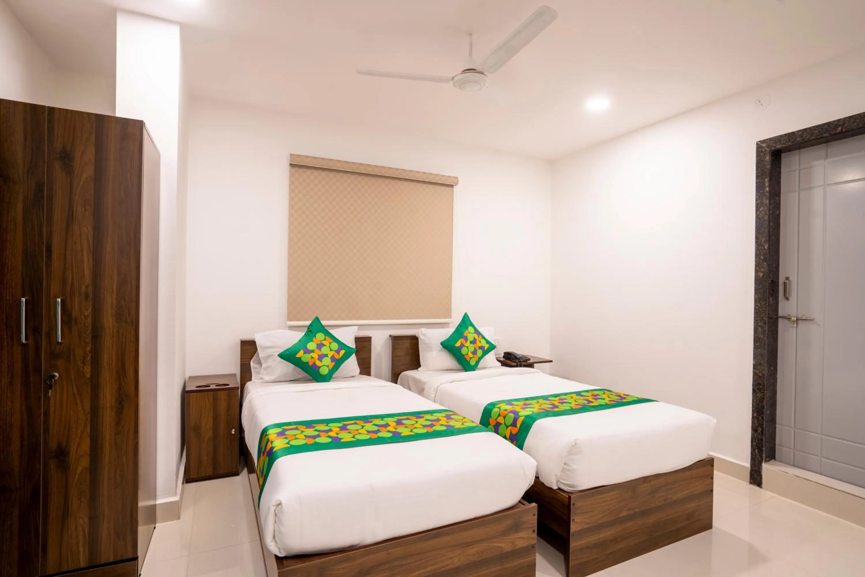 Bedroom, Bed in Treebo De Alphabet Gachibowli