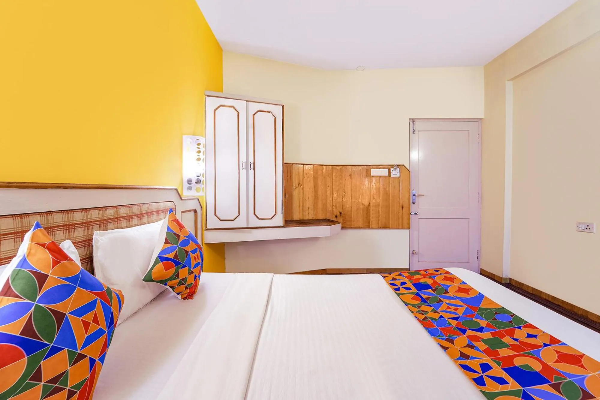 Bed in FabHotel JS Heritage