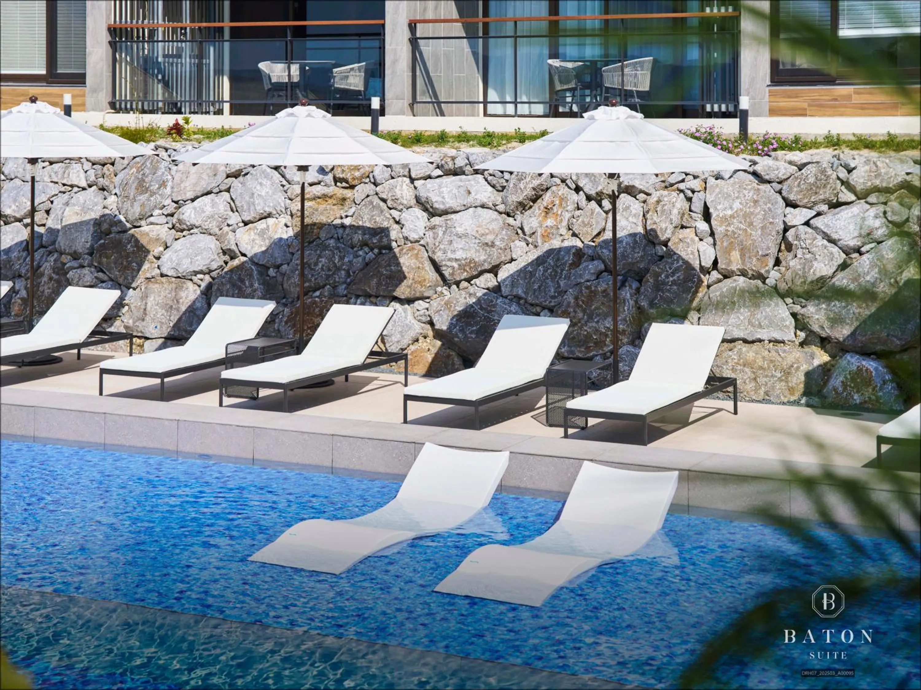 Pool view in BATON SUITE Okinawa-kourijima