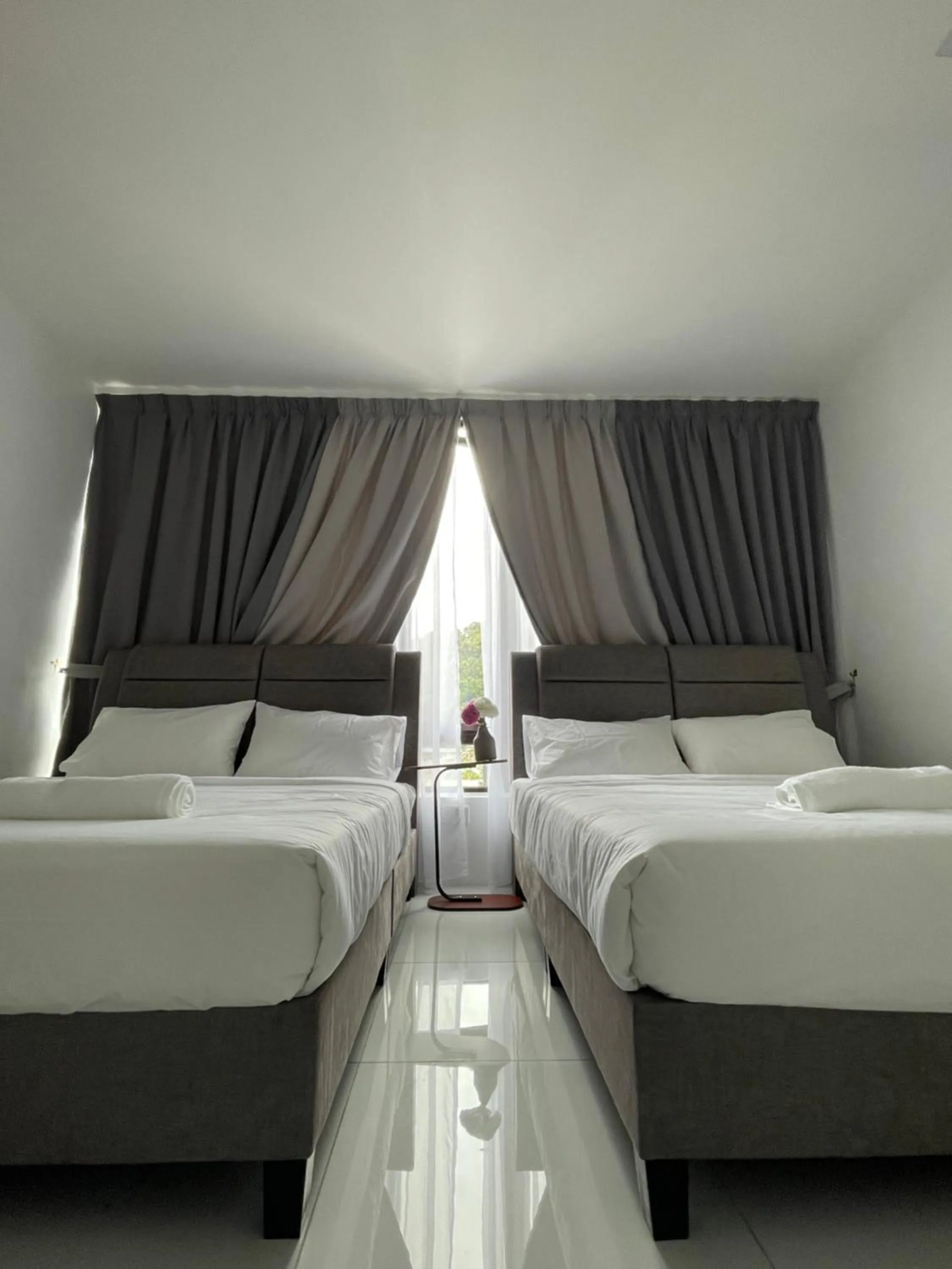Bed in TDOZE Hotel