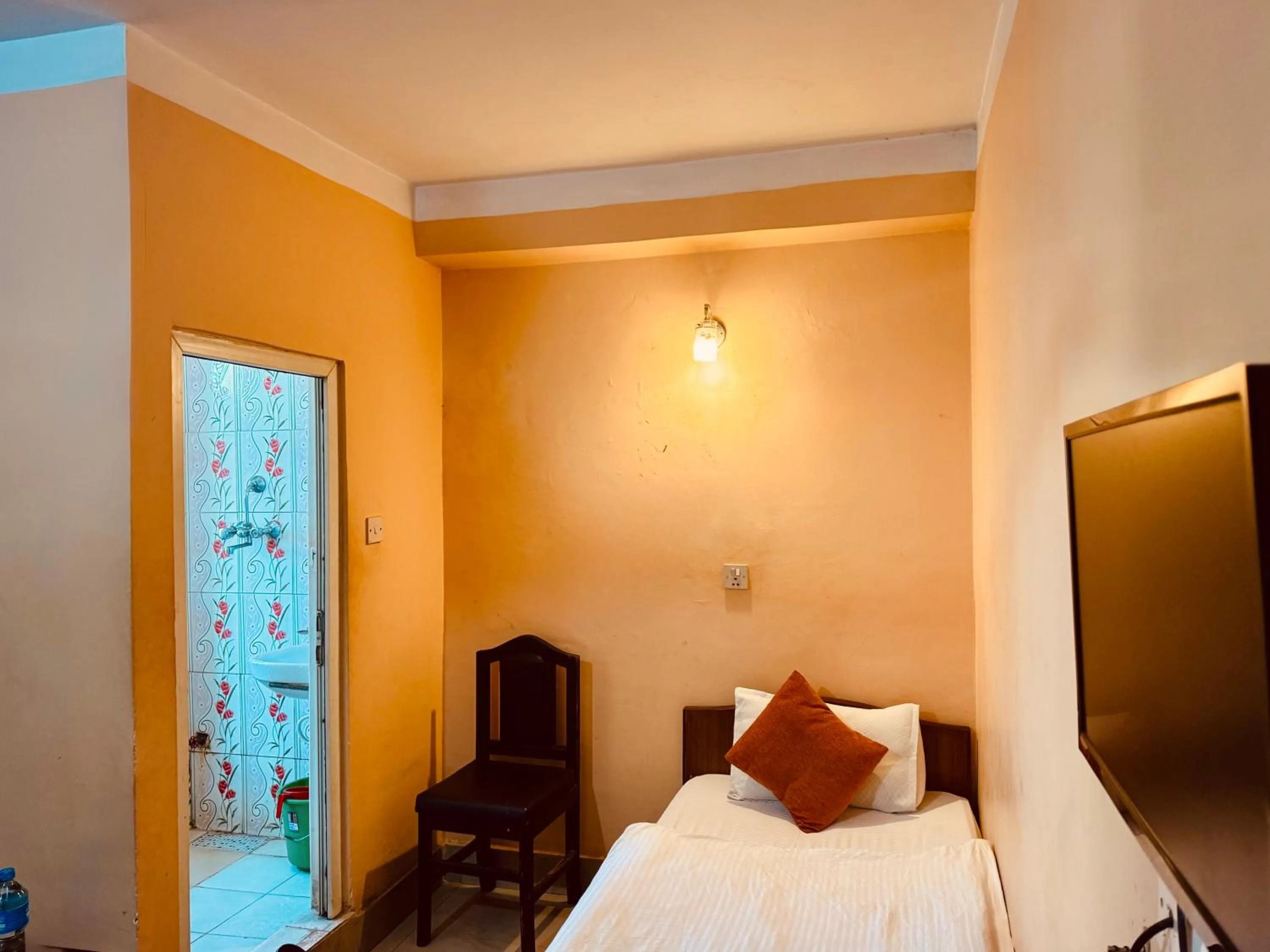 Bed in Om Mandakini Hotel