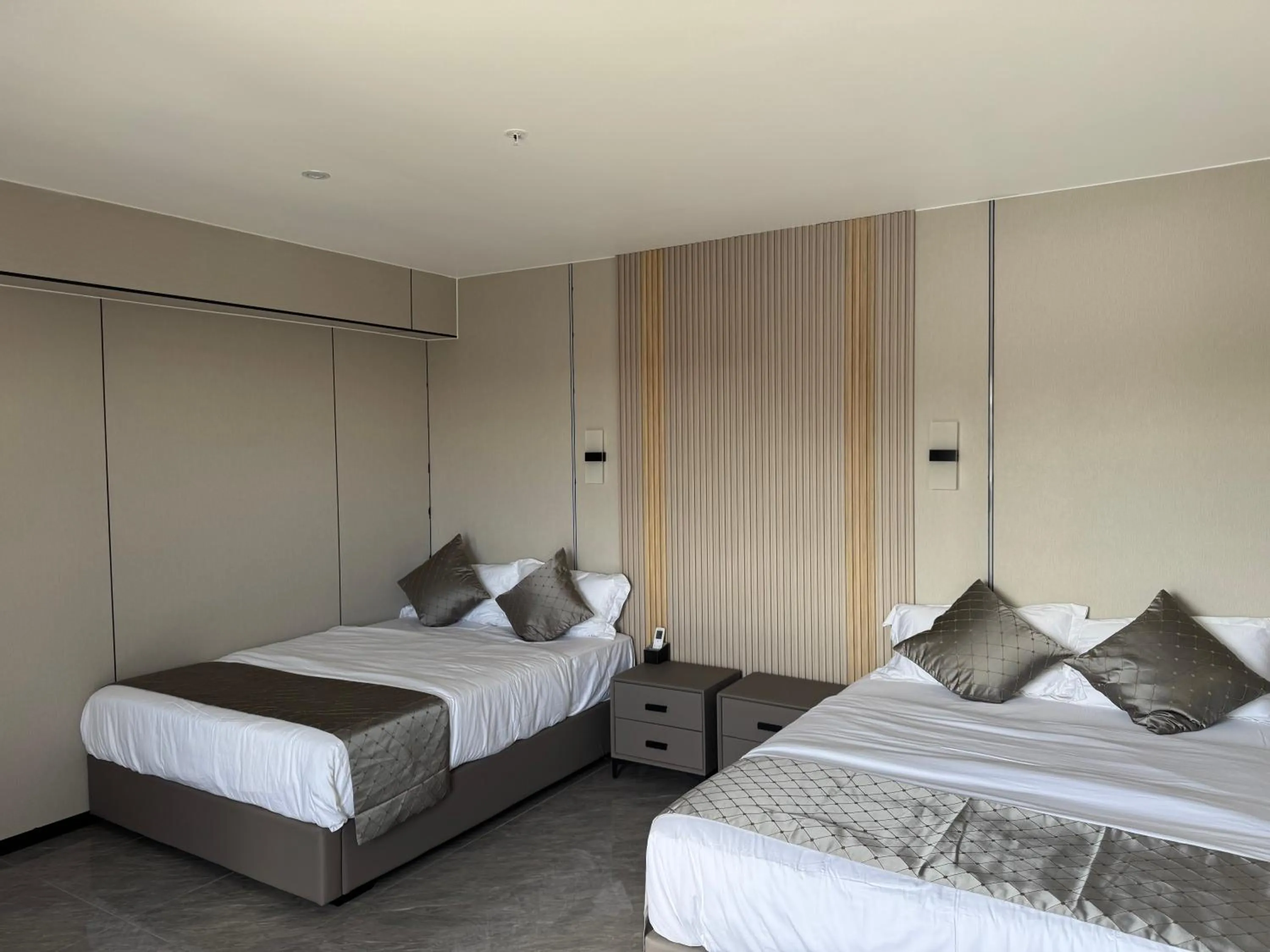 Bed in Taufusi Hotel