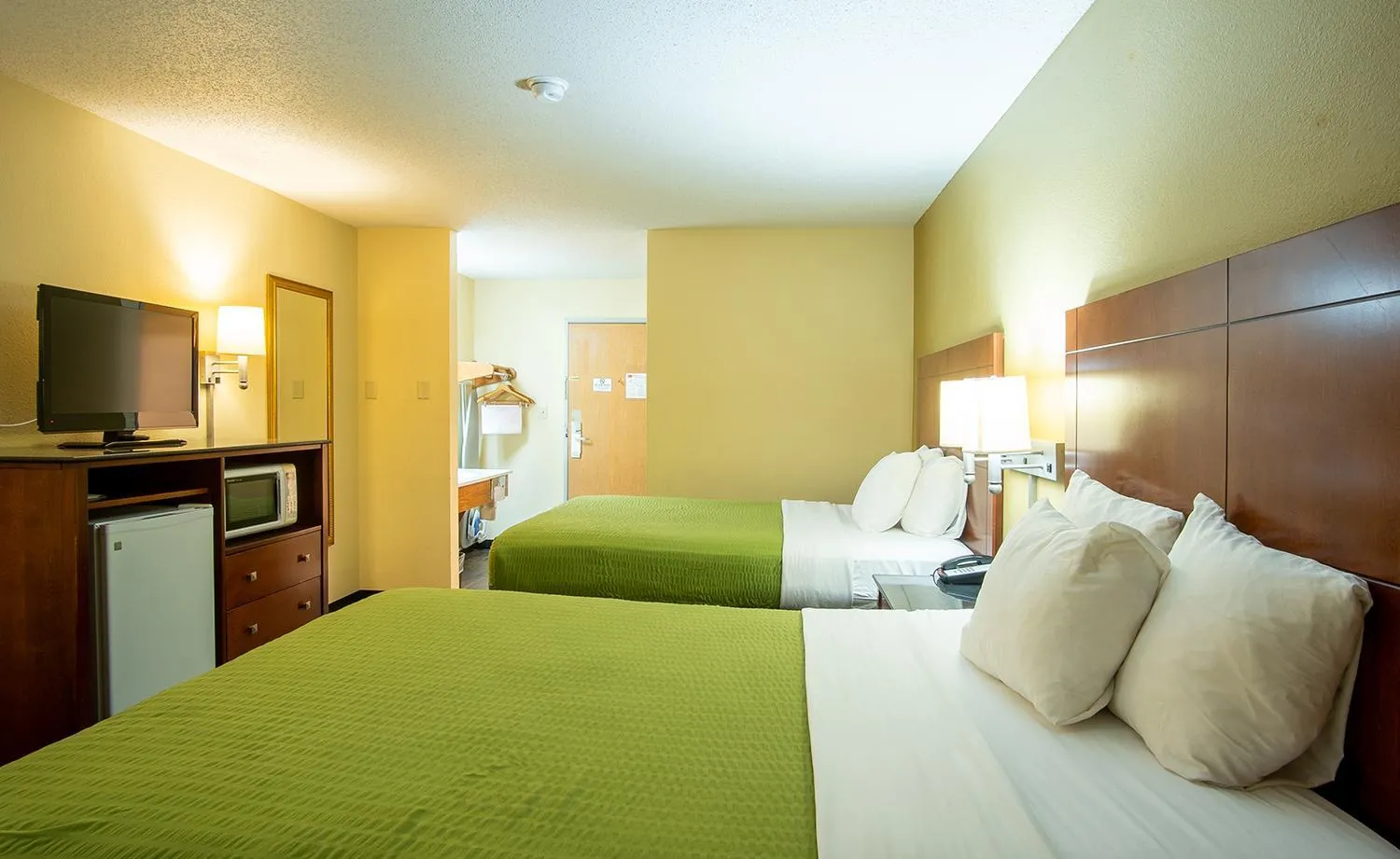 Bedroom, Bed in Coratel Inn and Suites By Jasper River Falls