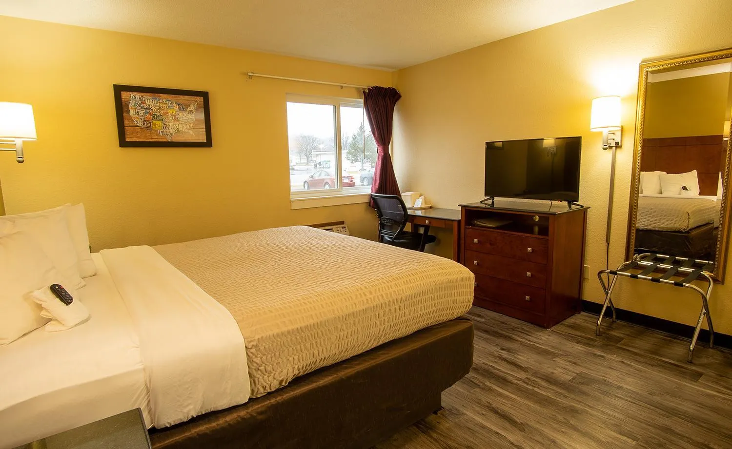 Bedroom, Bed in Coratel Inn and Suites By Jasper River Falls